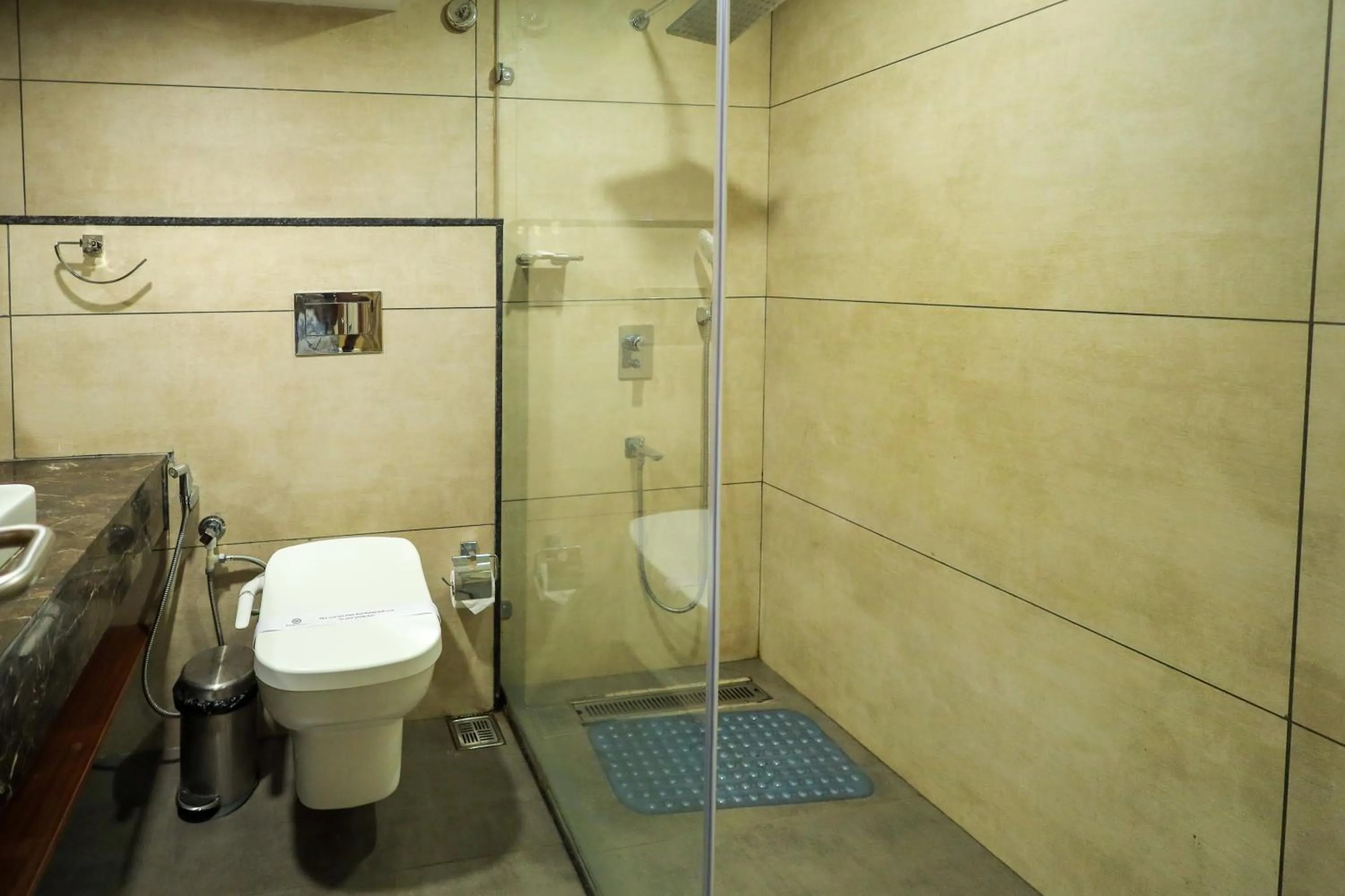 Bathroom in Royal Plaza Suites by RAK Rooms, Mangaluru