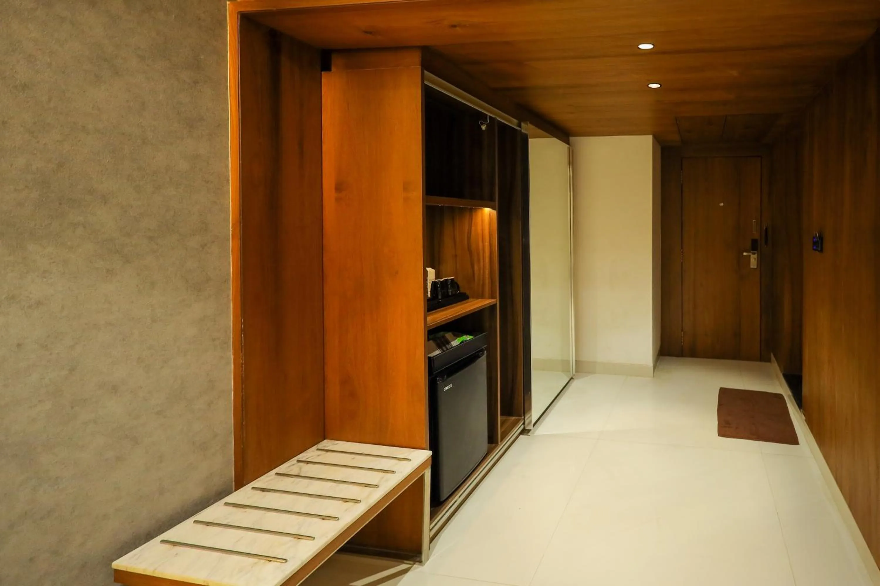 wardrobe in Royal Plaza Suites by RAK Rooms, Mangaluru