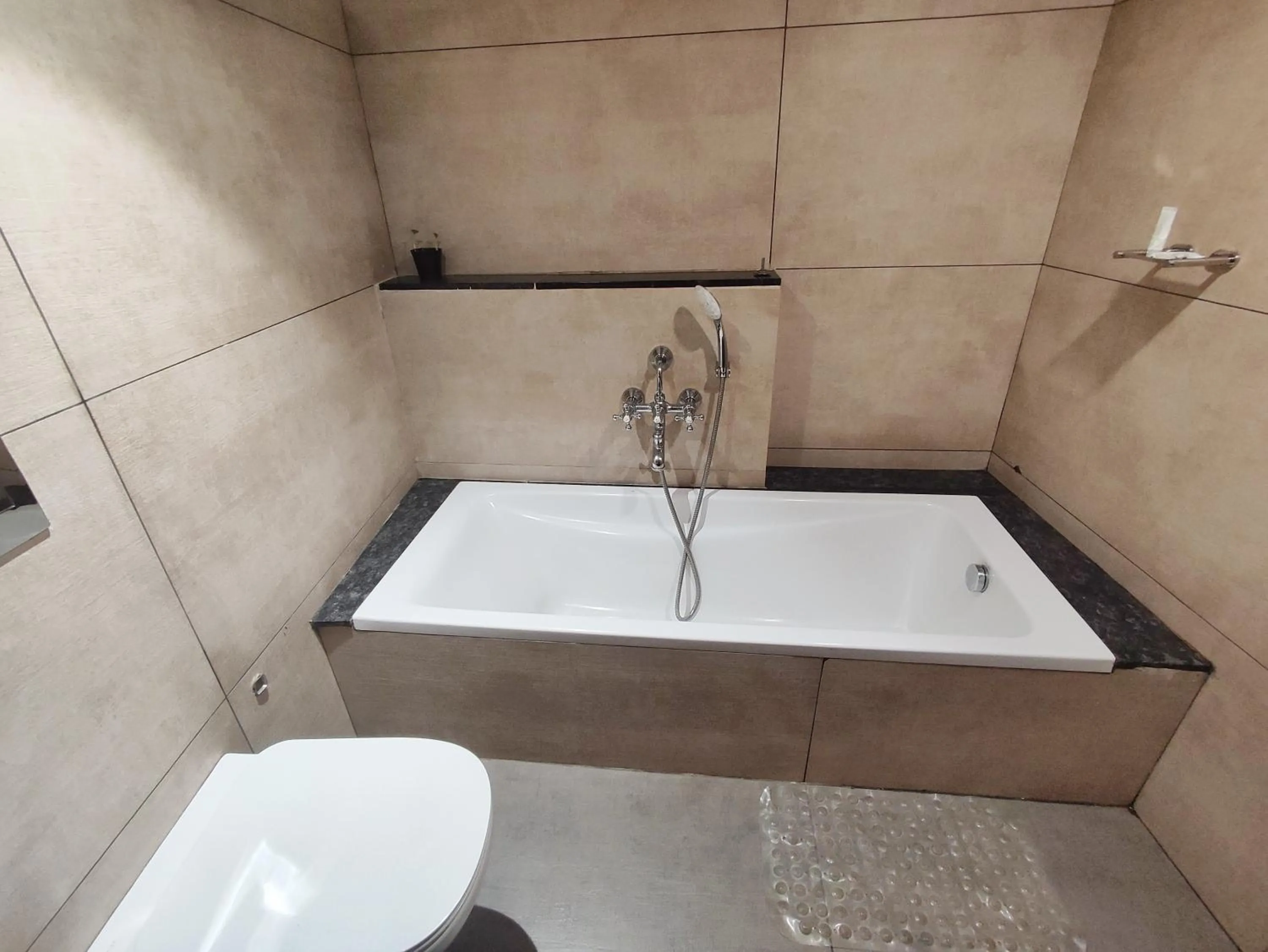 Bath in Royal Plaza Suites by RAK Rooms, Mangaluru