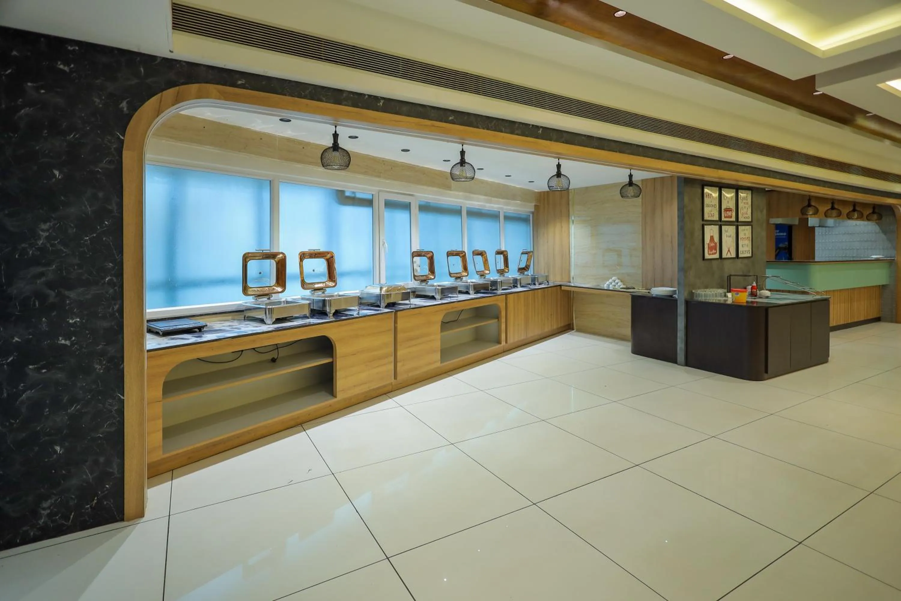 kitchen in Royal Plaza Suites by RAK Rooms, Mangaluru