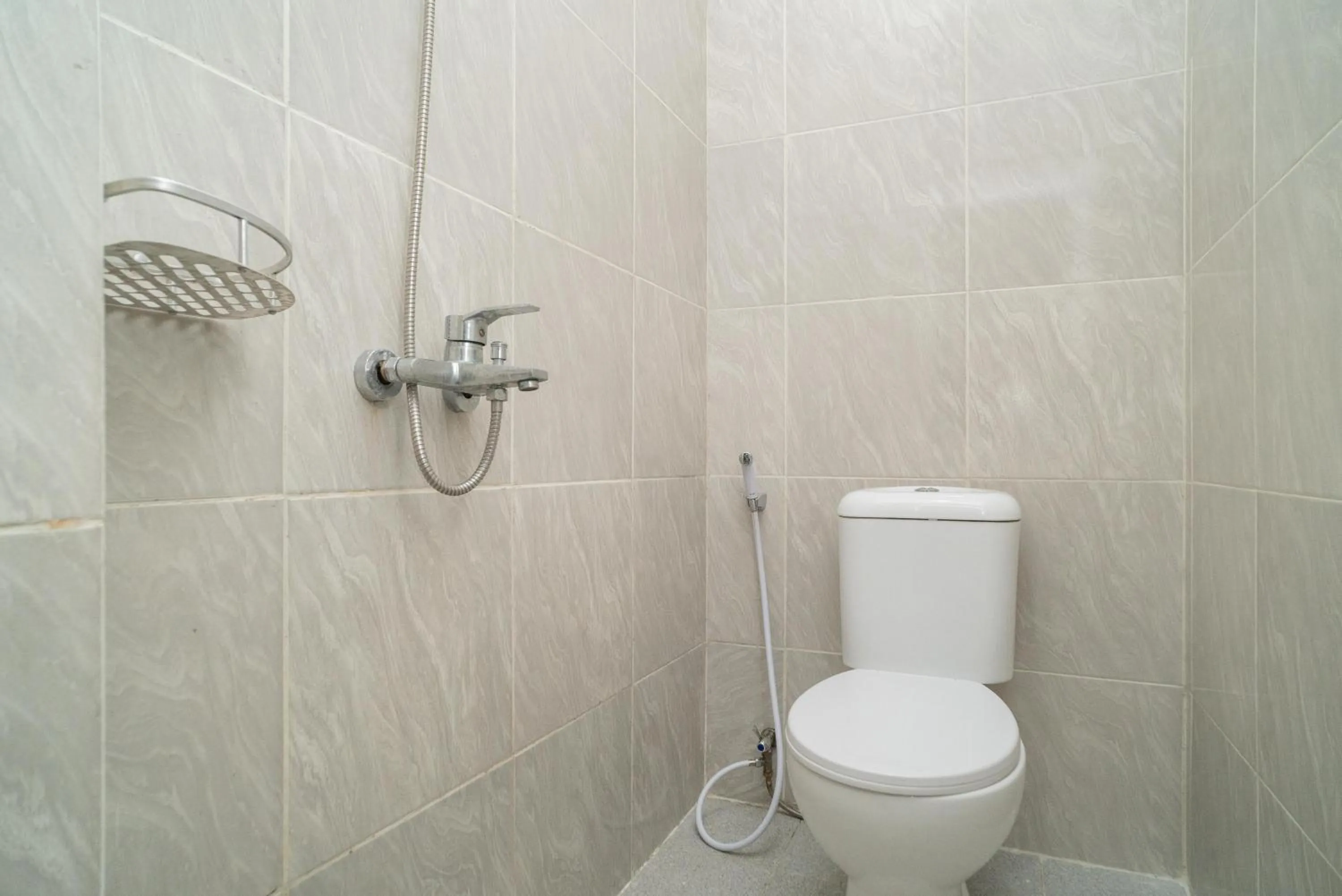 Bathroom in RedDoorz Plus near ITC Cempaka Mas 2