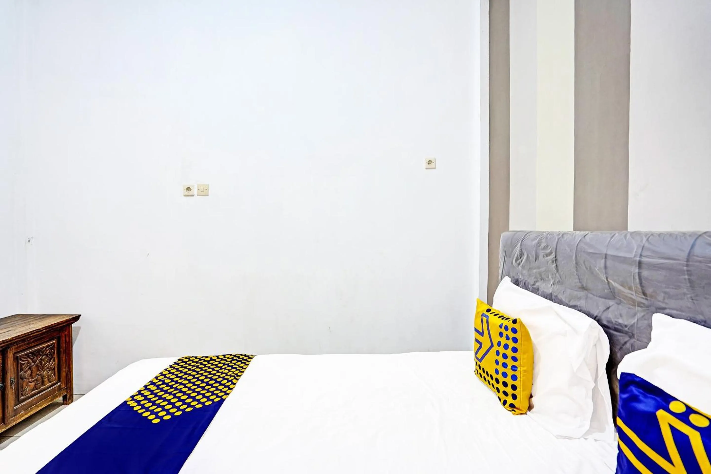 Bedroom in OYO 90943 Mochi 88 Homestay