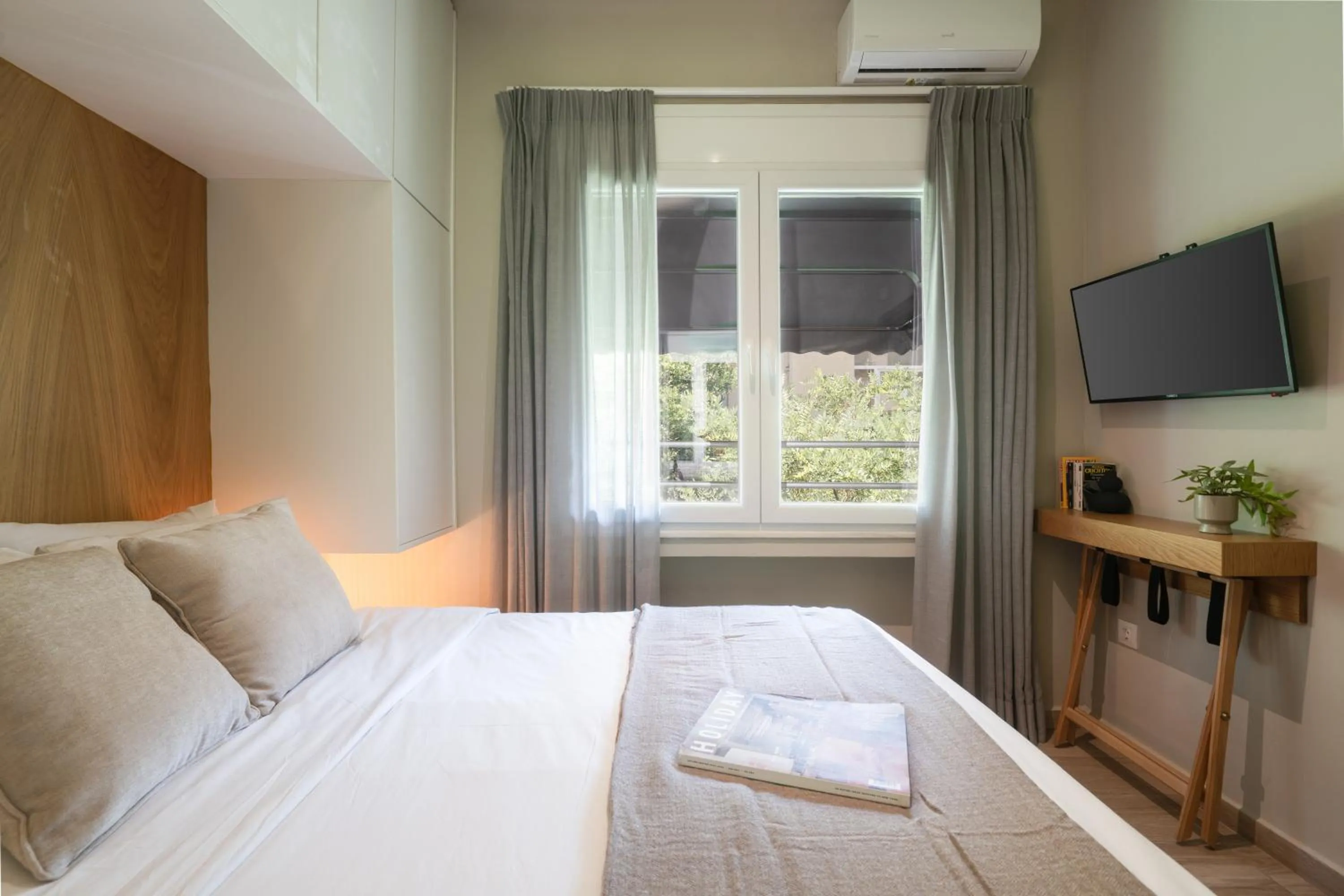 Bed in My Greek Vacations City Apartments