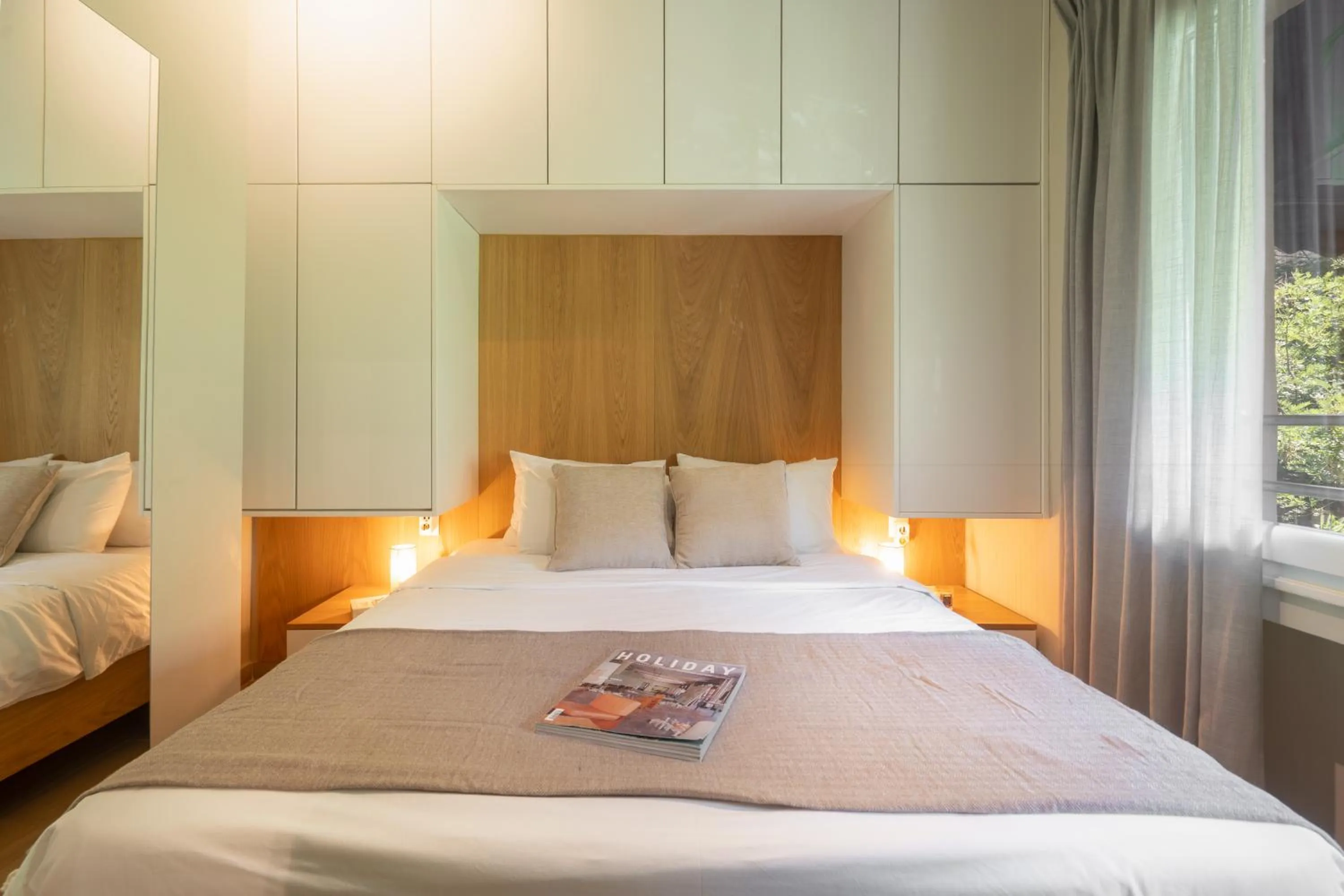 Bed in My Greek Vacations City Apartments