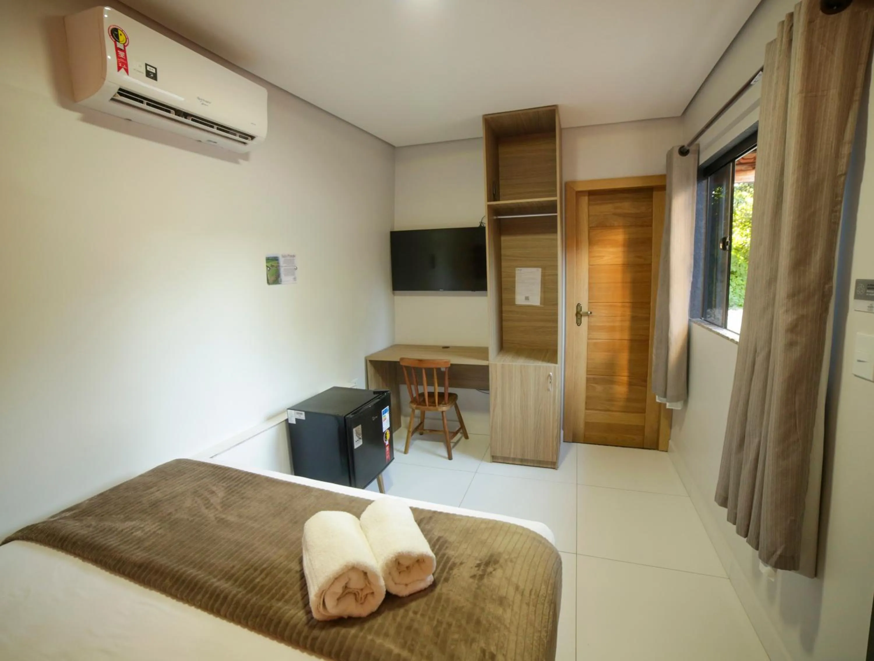 Bed in Pousada nossas Raízes