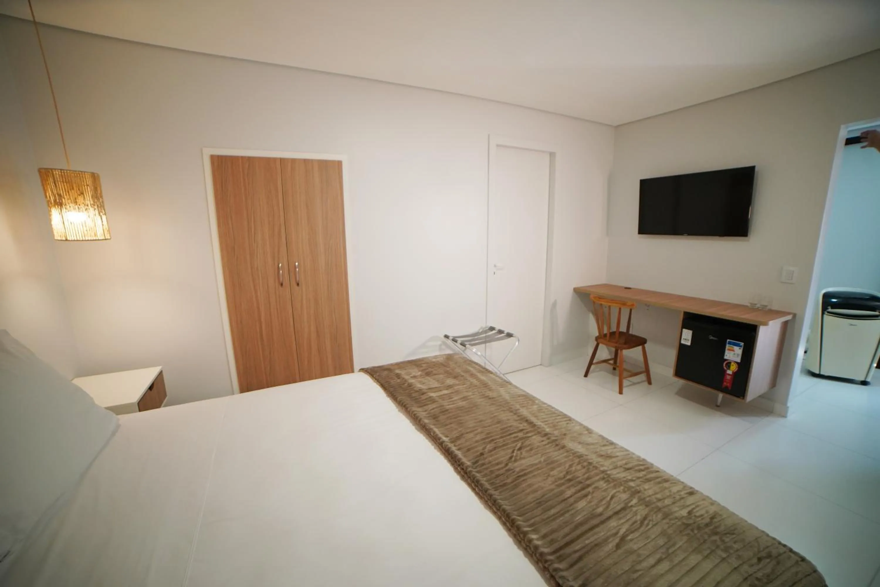 Bed in Pousada nossas Raízes