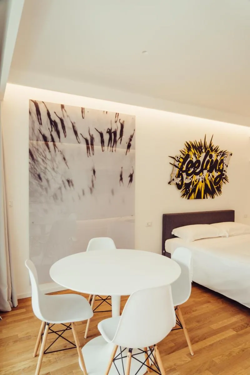 Communal lounge/ TV room, Bed in Marina Gardens Boutique&Suites