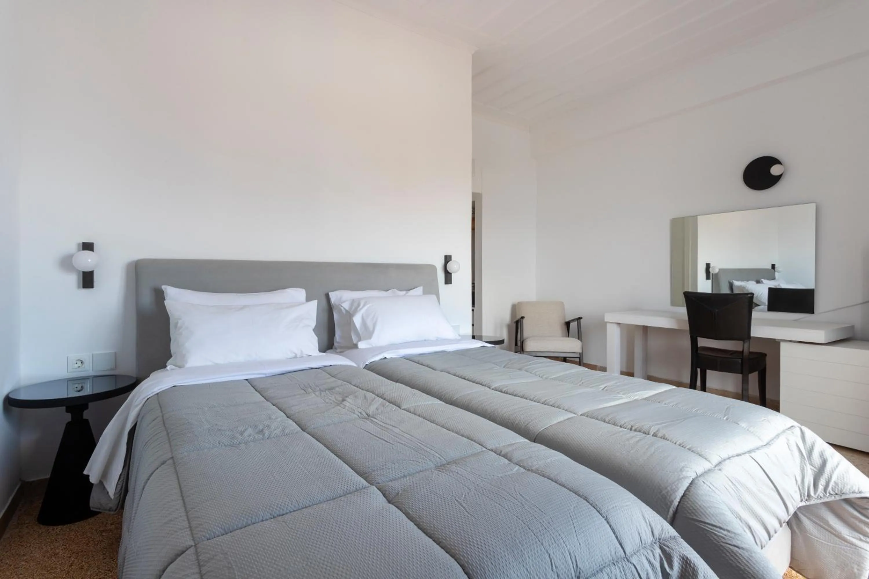 Bed in Hotel Roumani