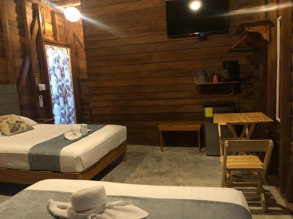 Bed in Cabañas Chac Mool Downtown