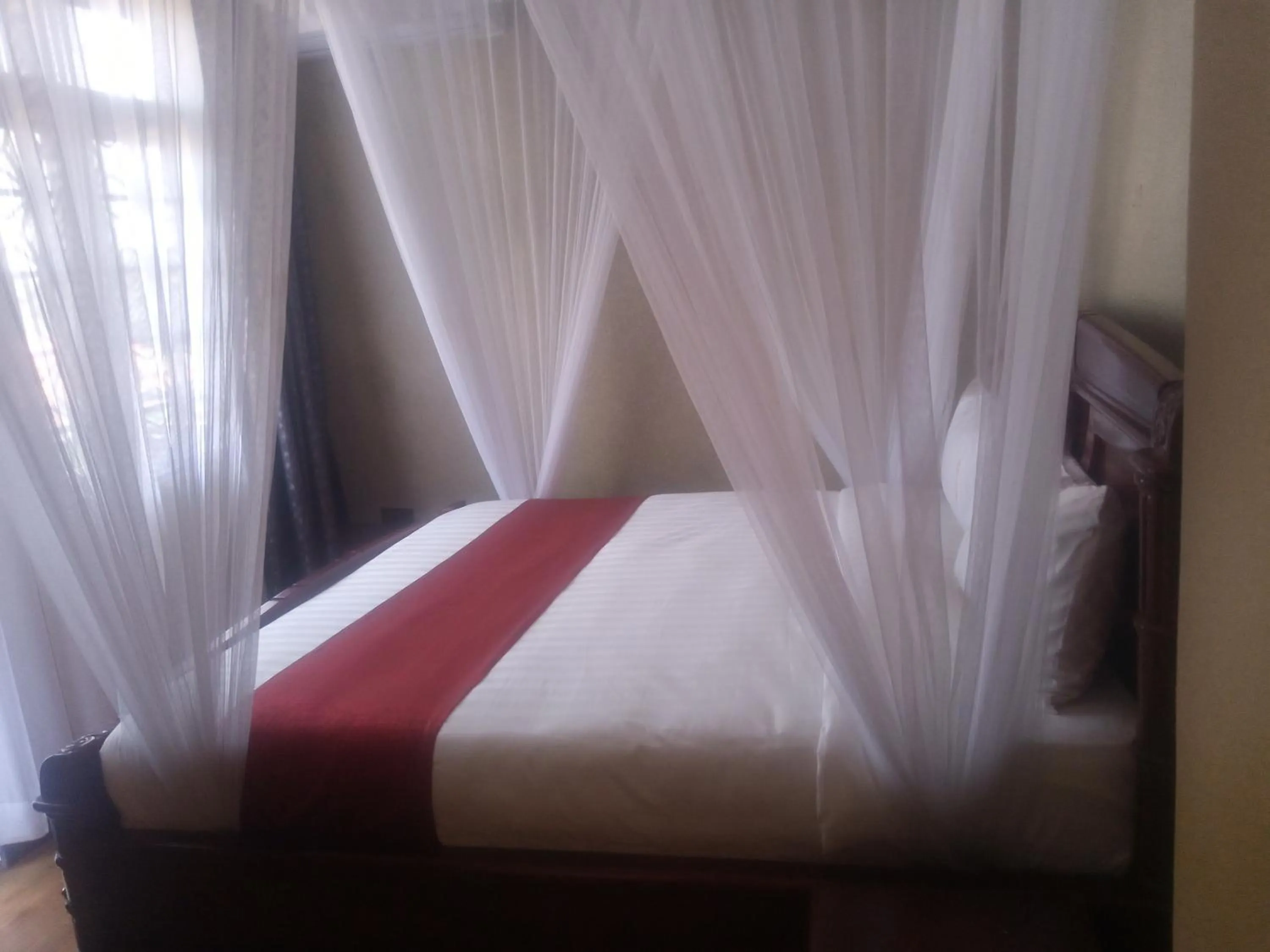 Bed in Mlex Hotel