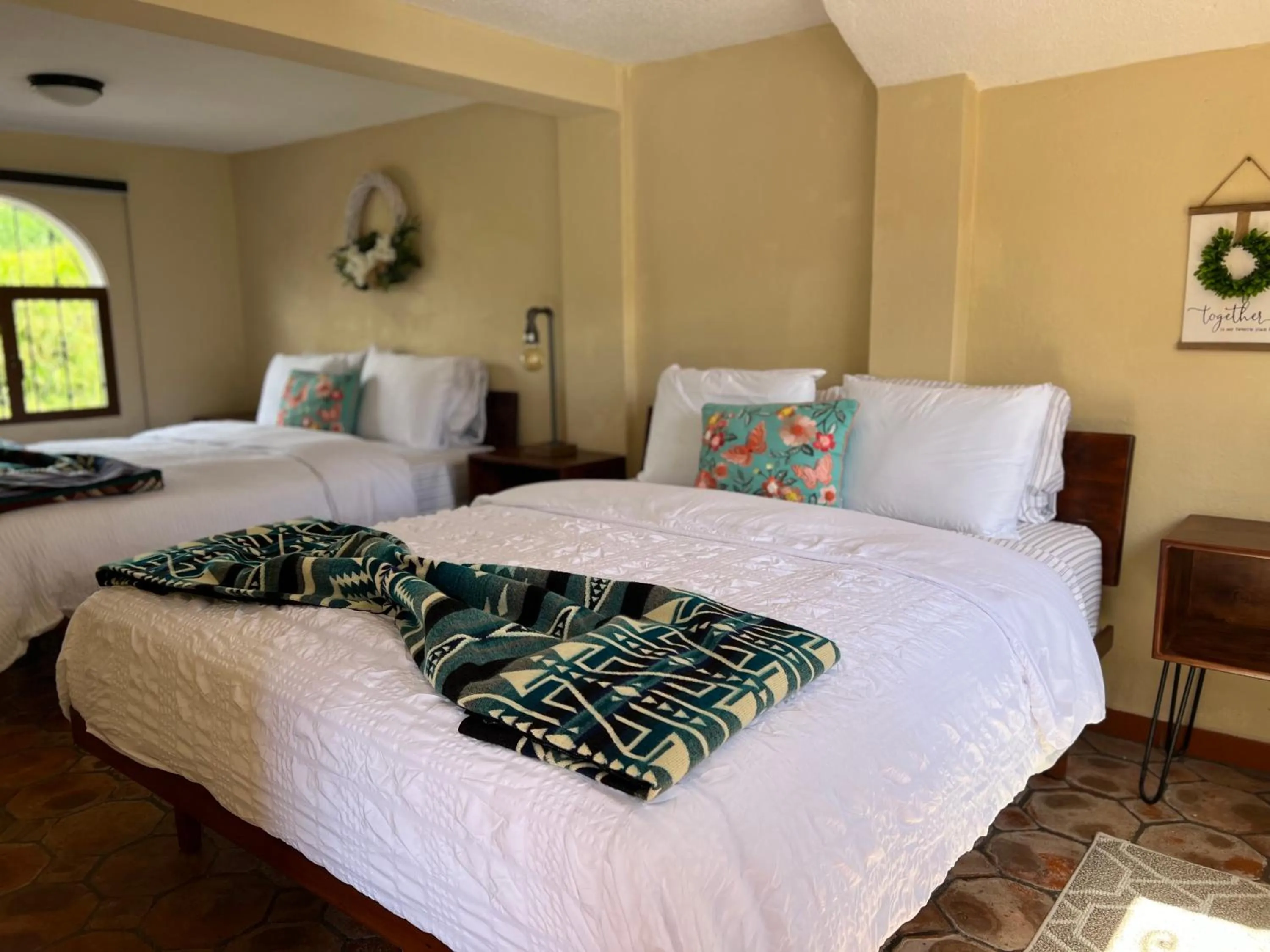 Bed in Hacienda Santa Ana Lodging