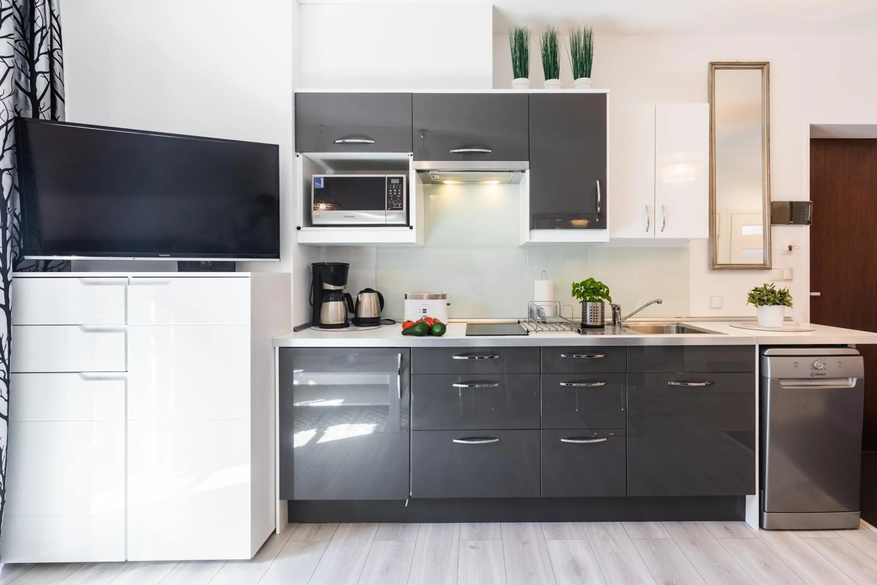 Kitchen or kitchenette in ApartHost Rezydencja Sienkiewicza