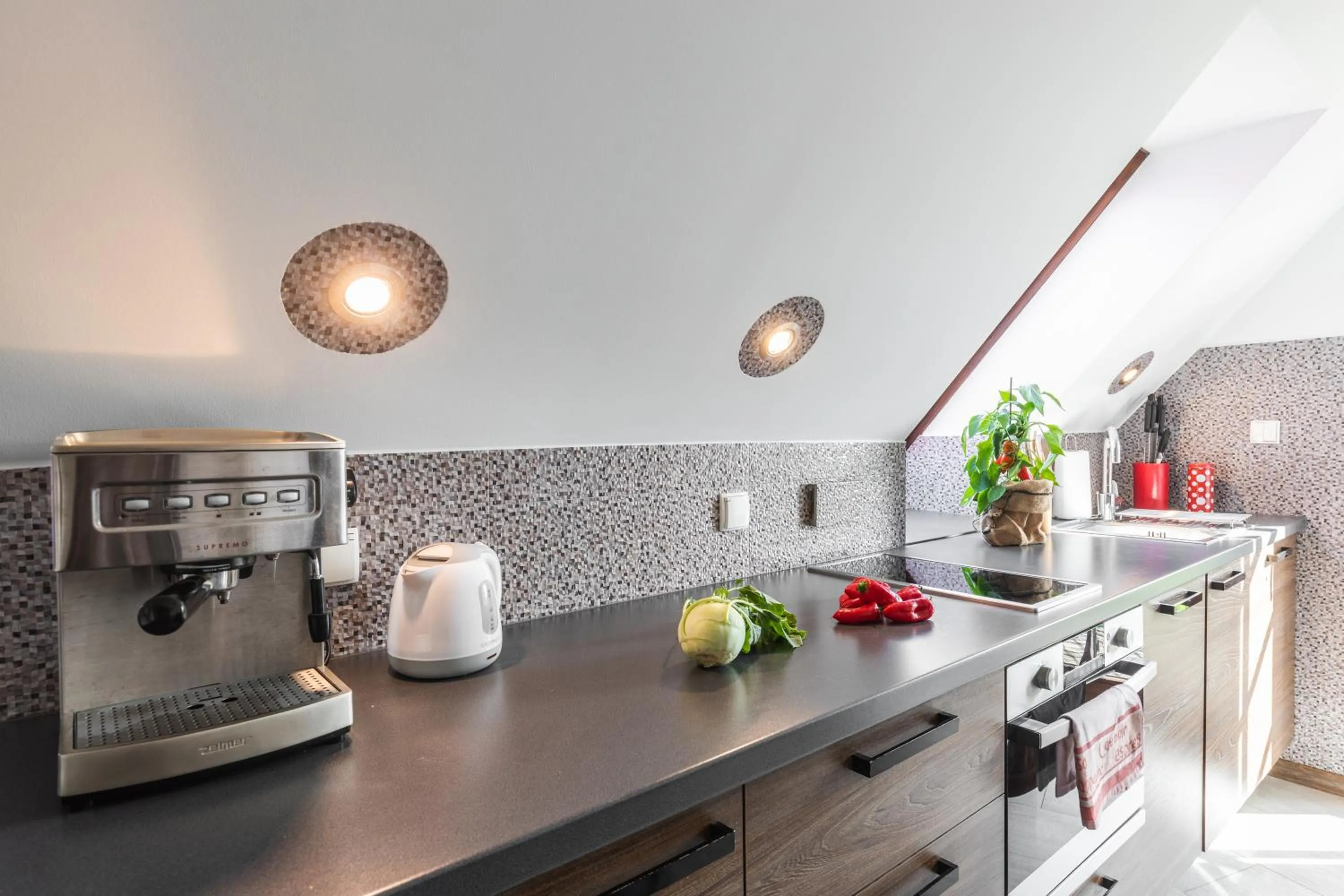 Kitchen or kitchenette in ApartHost Rezydencja Sienkiewicza