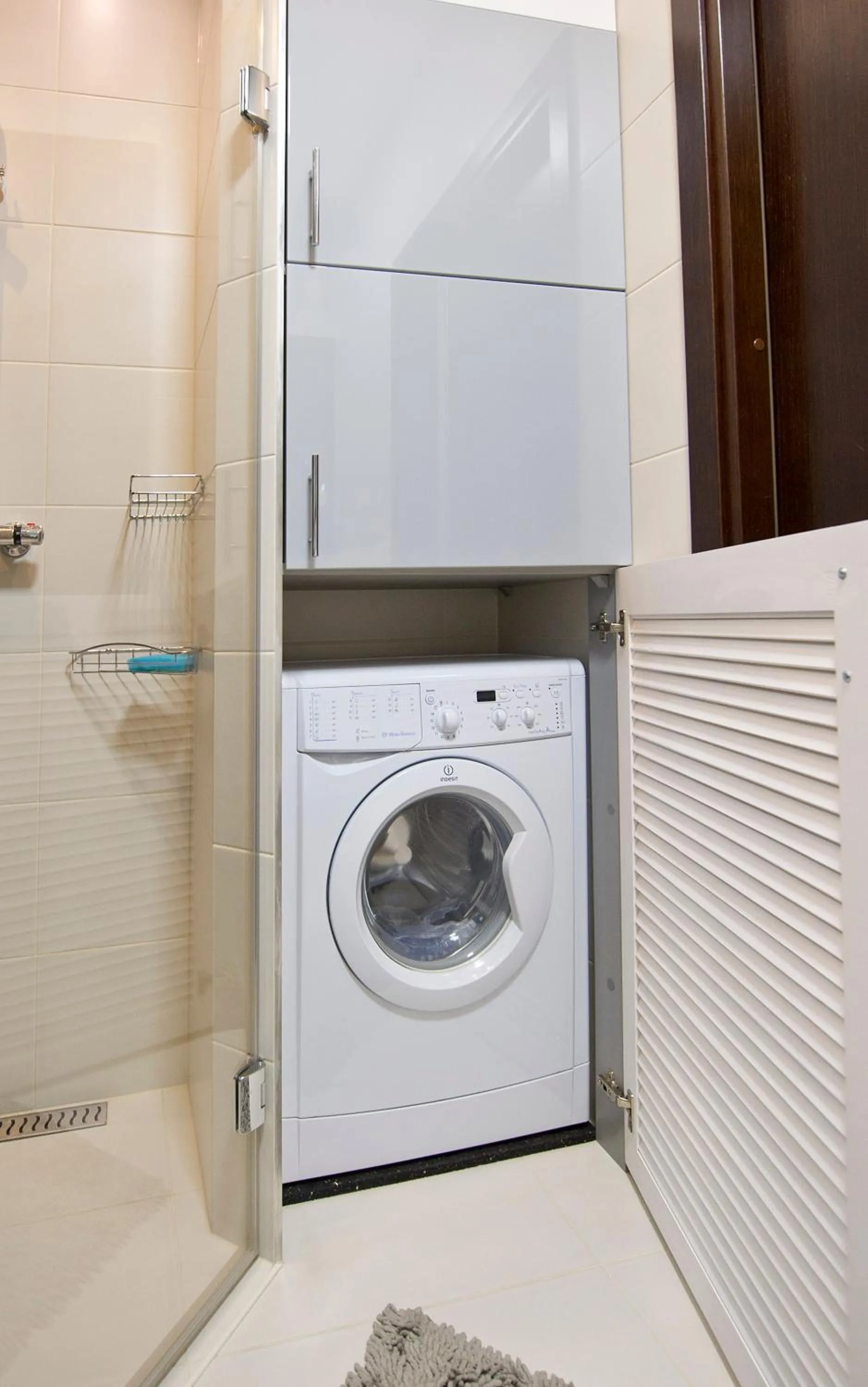 washing machine in ApartHost Rezydencja Sienkiewicza