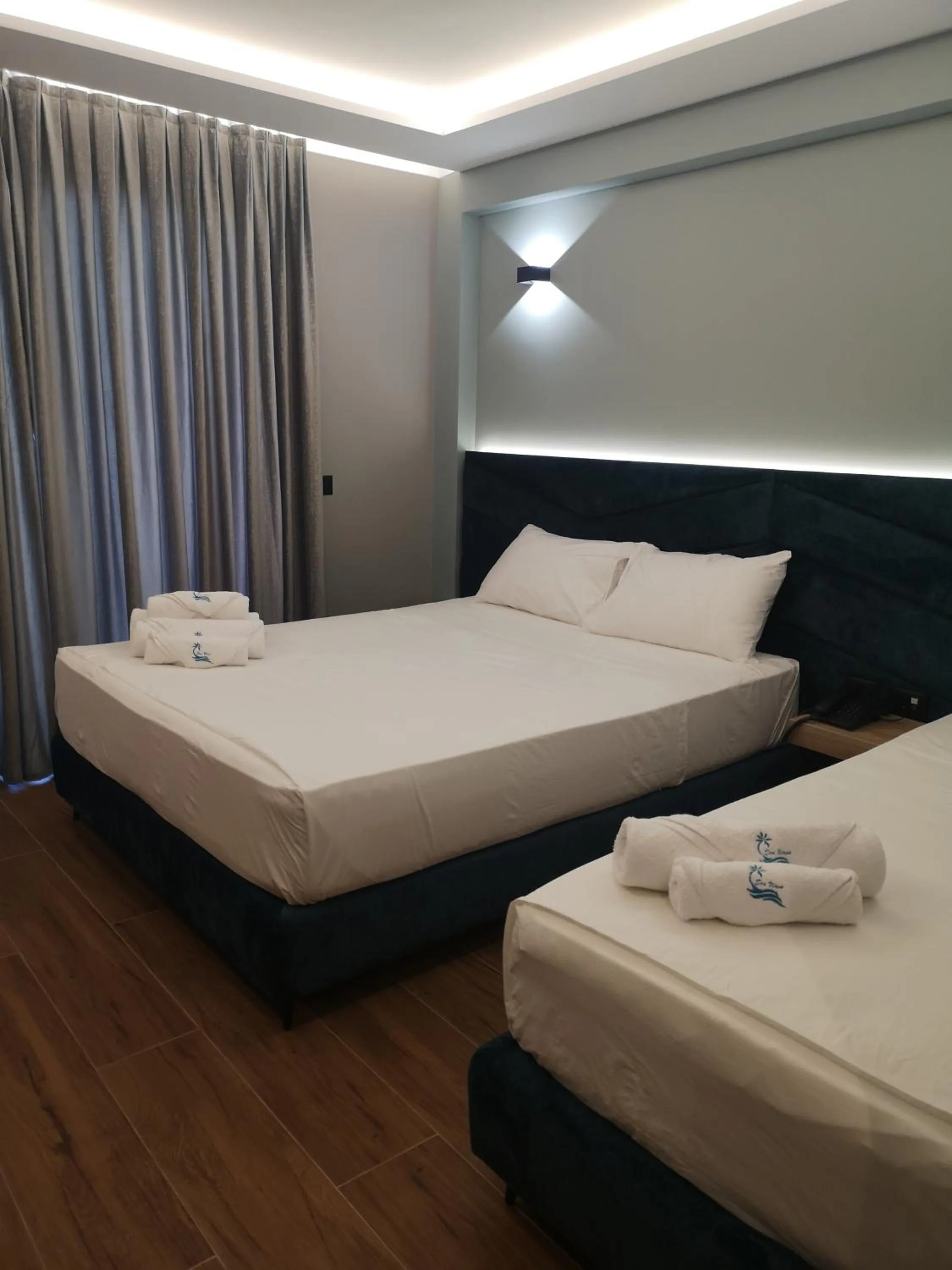 Bed in Seawave Hotel