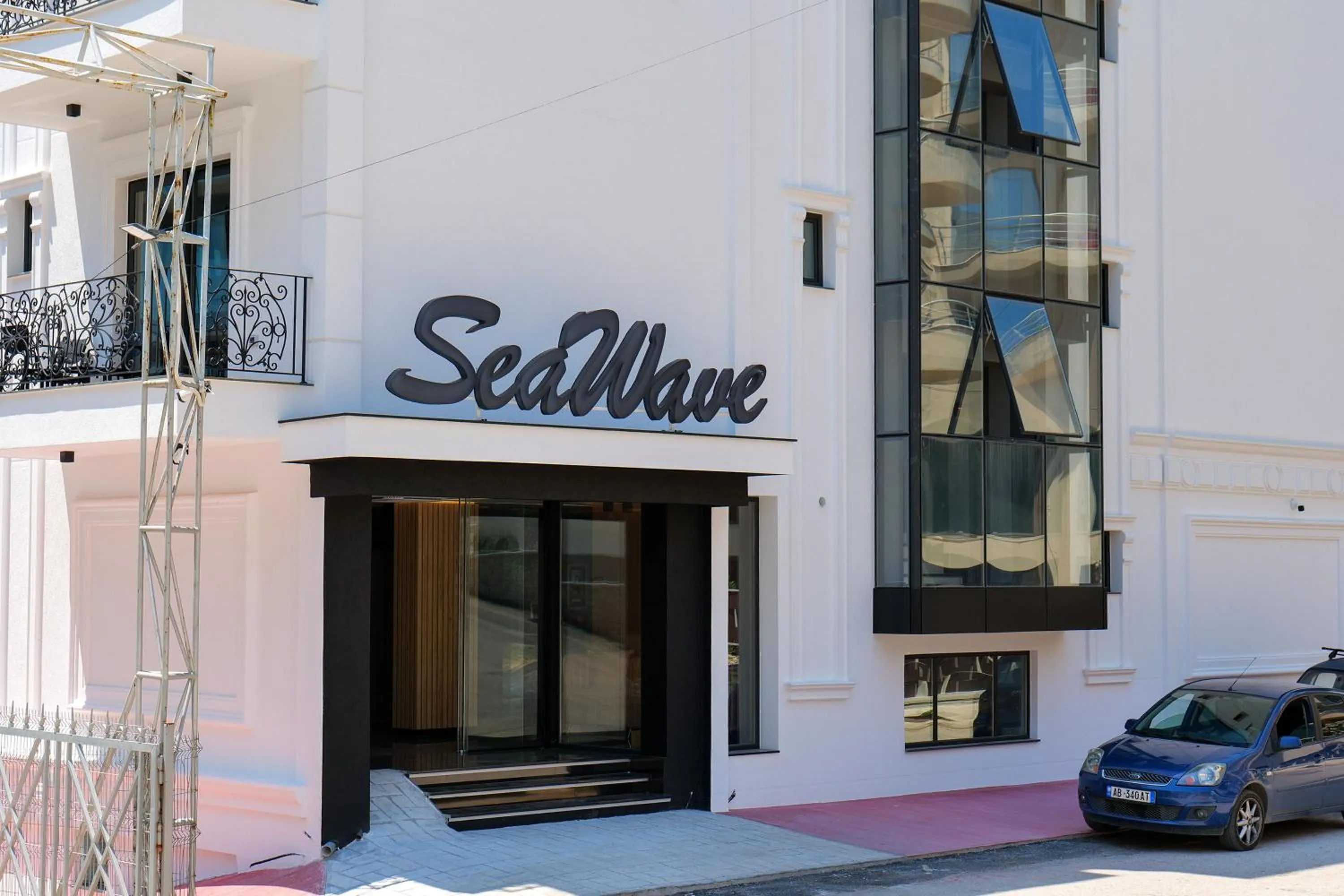 Property logo or sign in Seawave Hotel