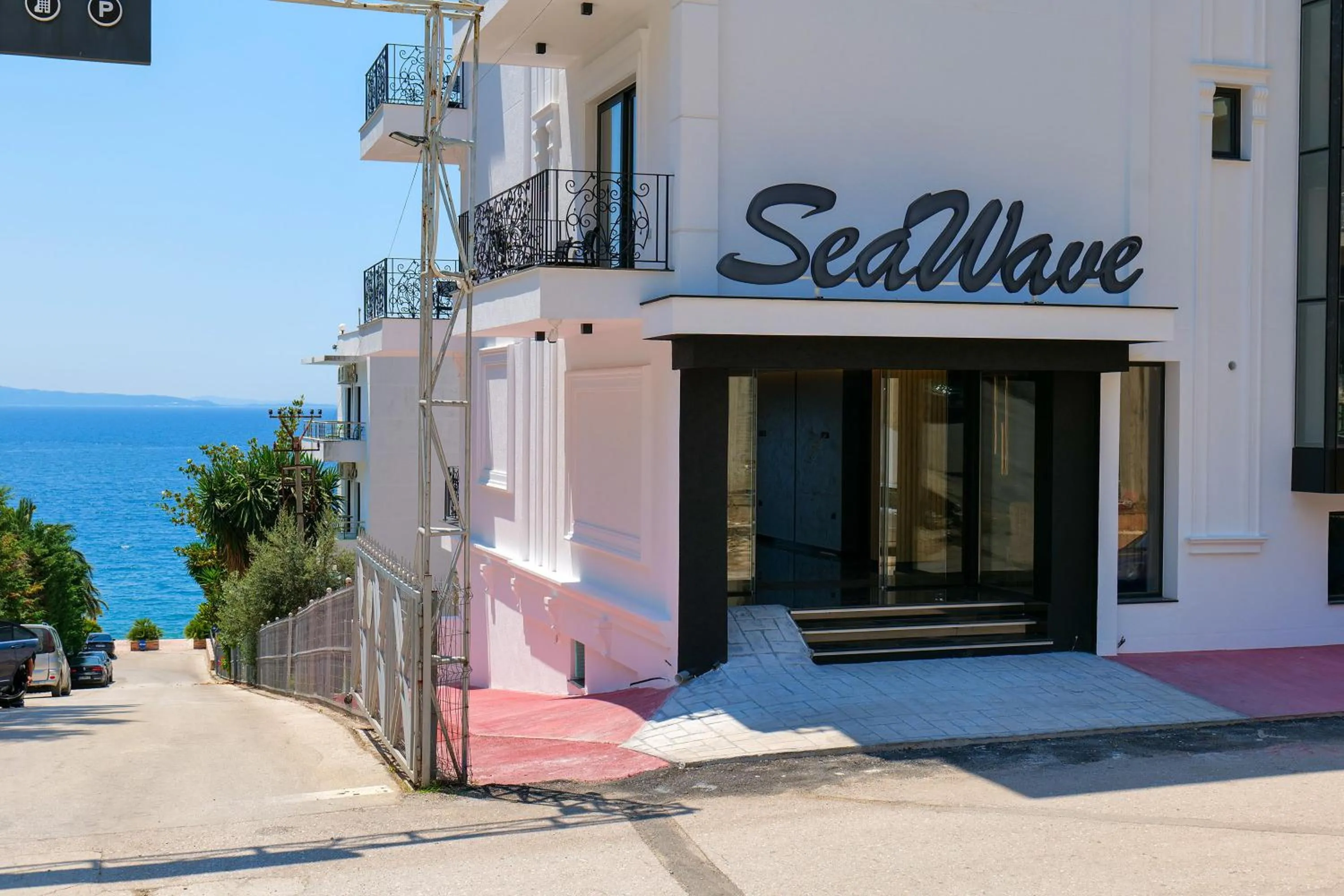 Property logo or sign in Seawave Hotel