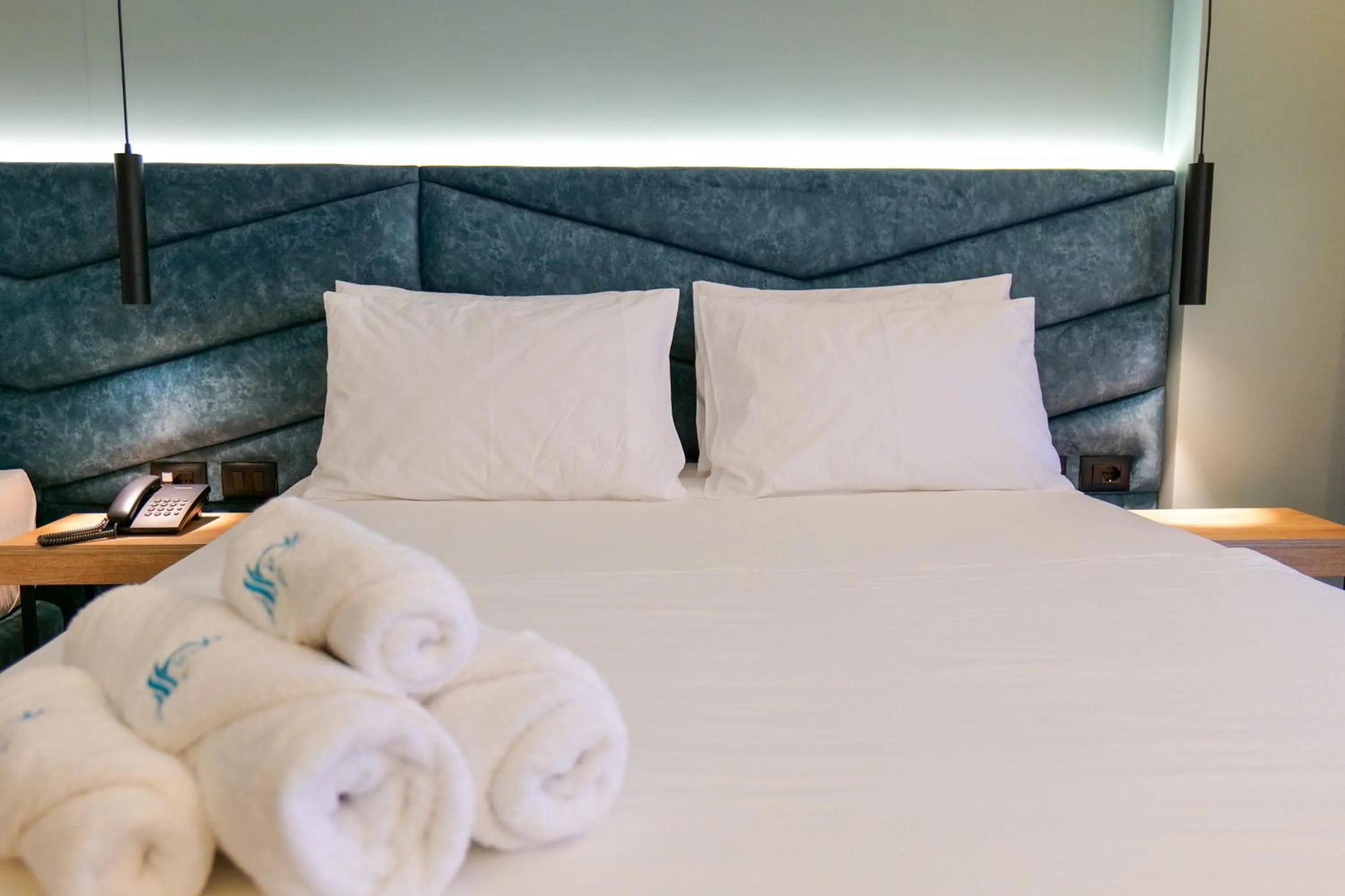 Bed in Seawave Hotel