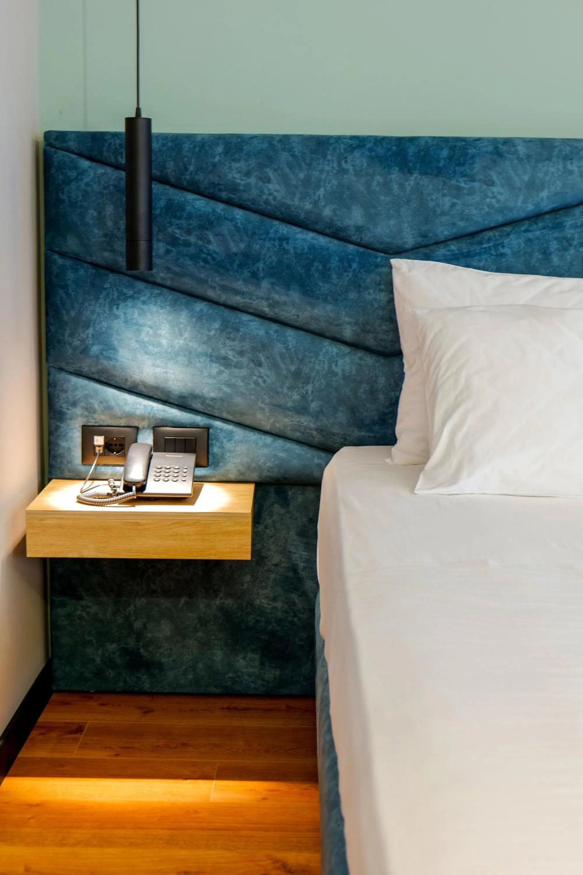 Bed in Seawave Hotel