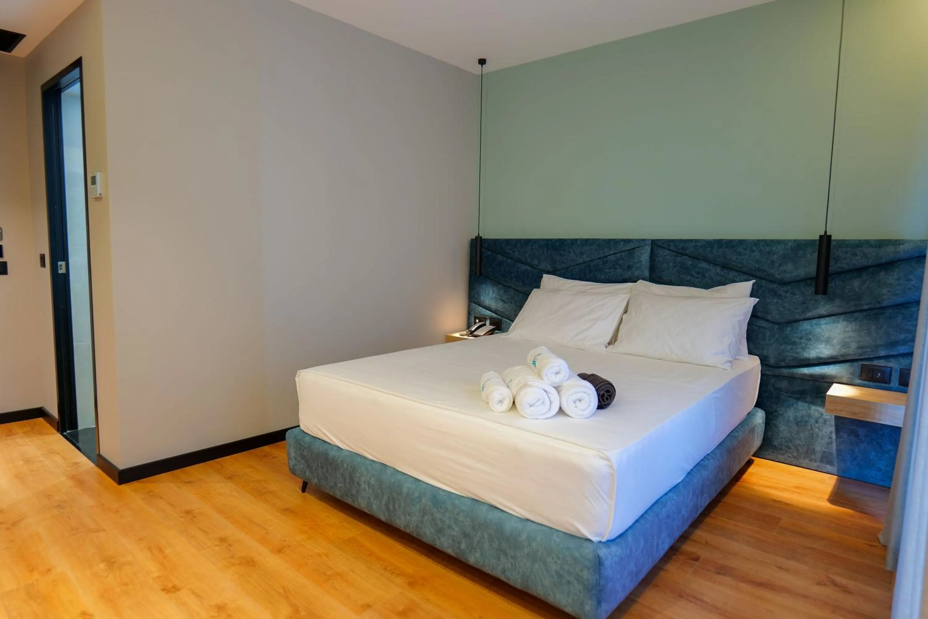 Bed in Seawave Hotel