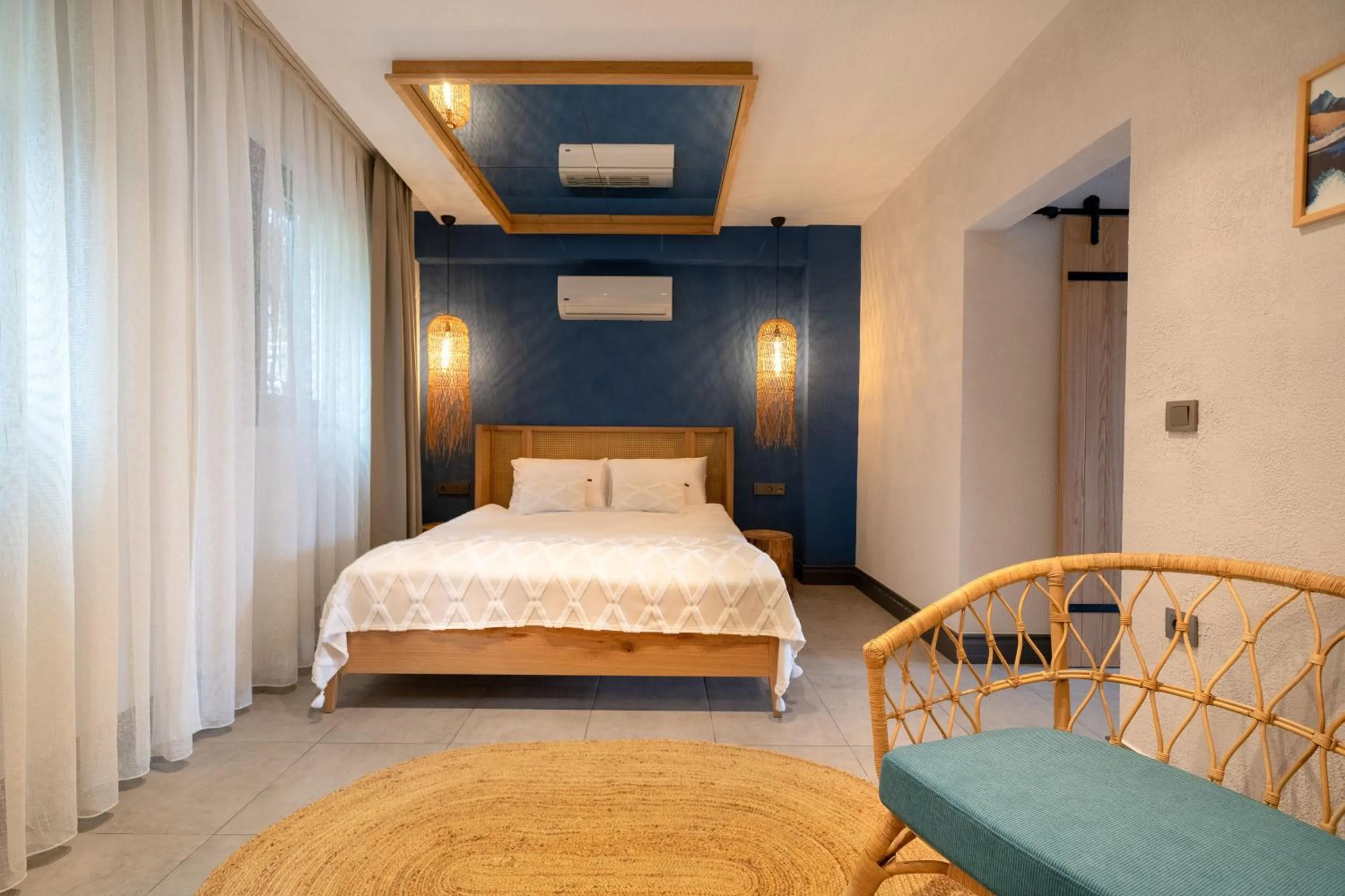 Bedroom in Reddoors Suites Sea View