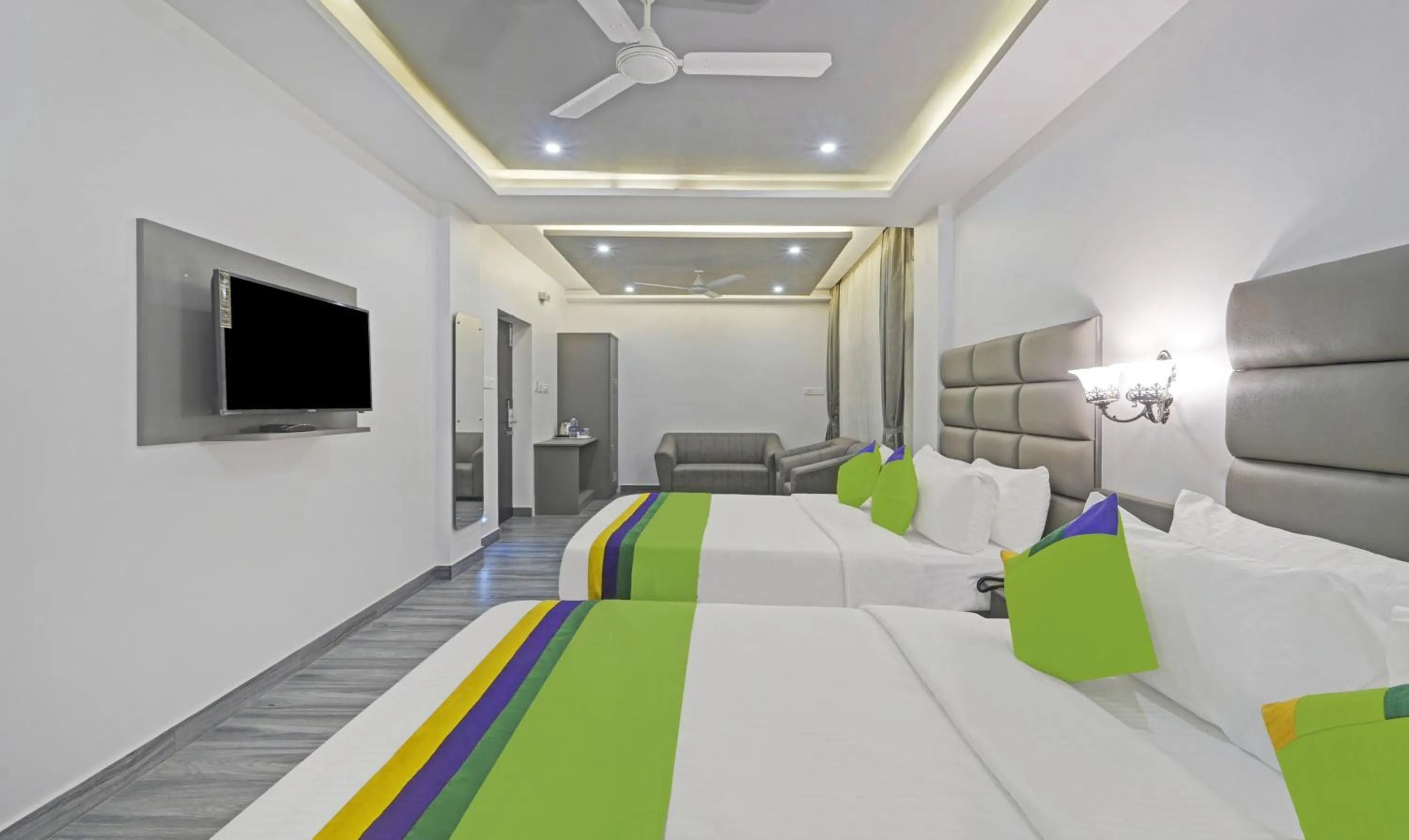 Bed in Treebo Premium Raffis' Andalusia Bay Way