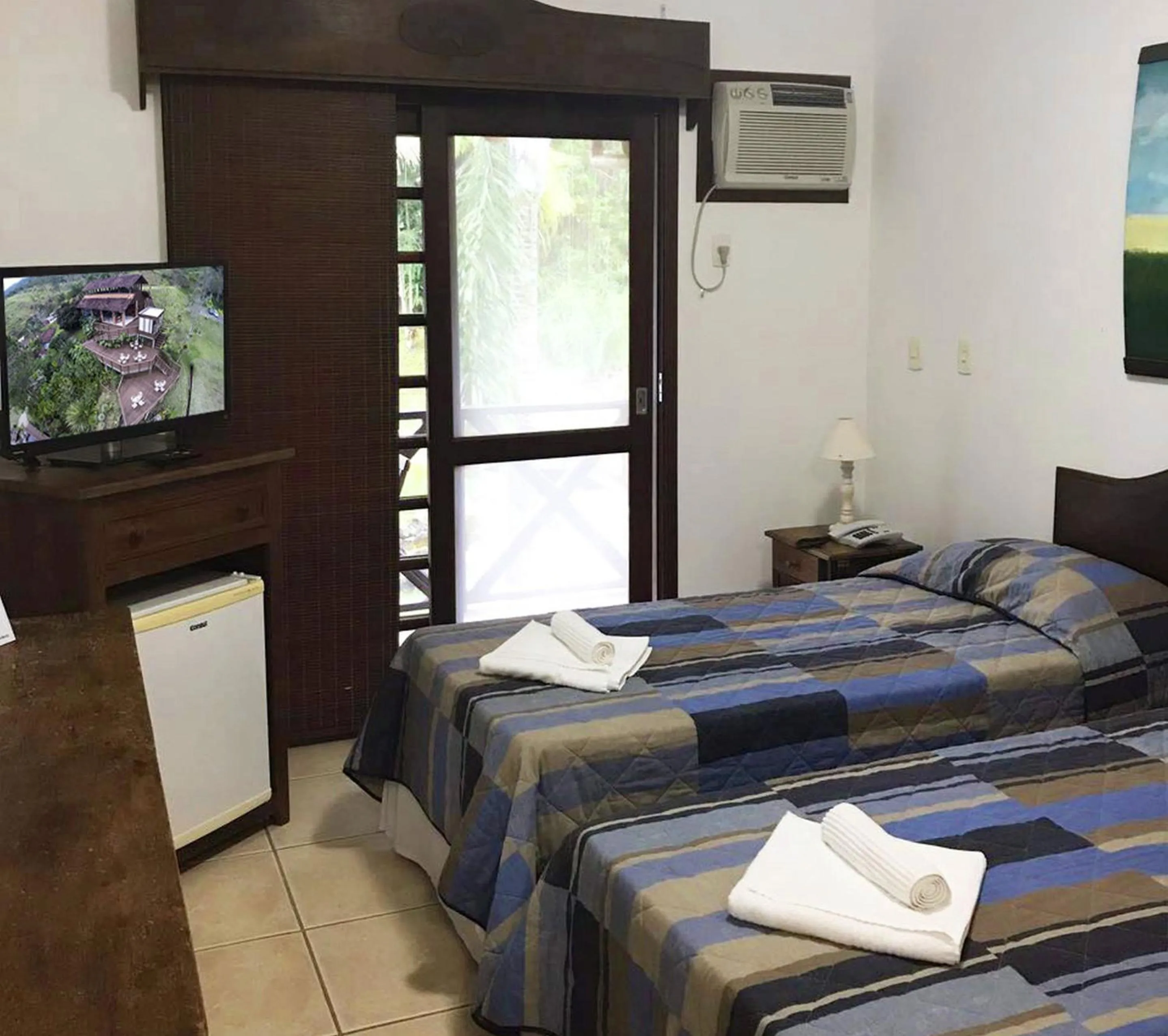 Bed in Pousada Arraial do Ouro