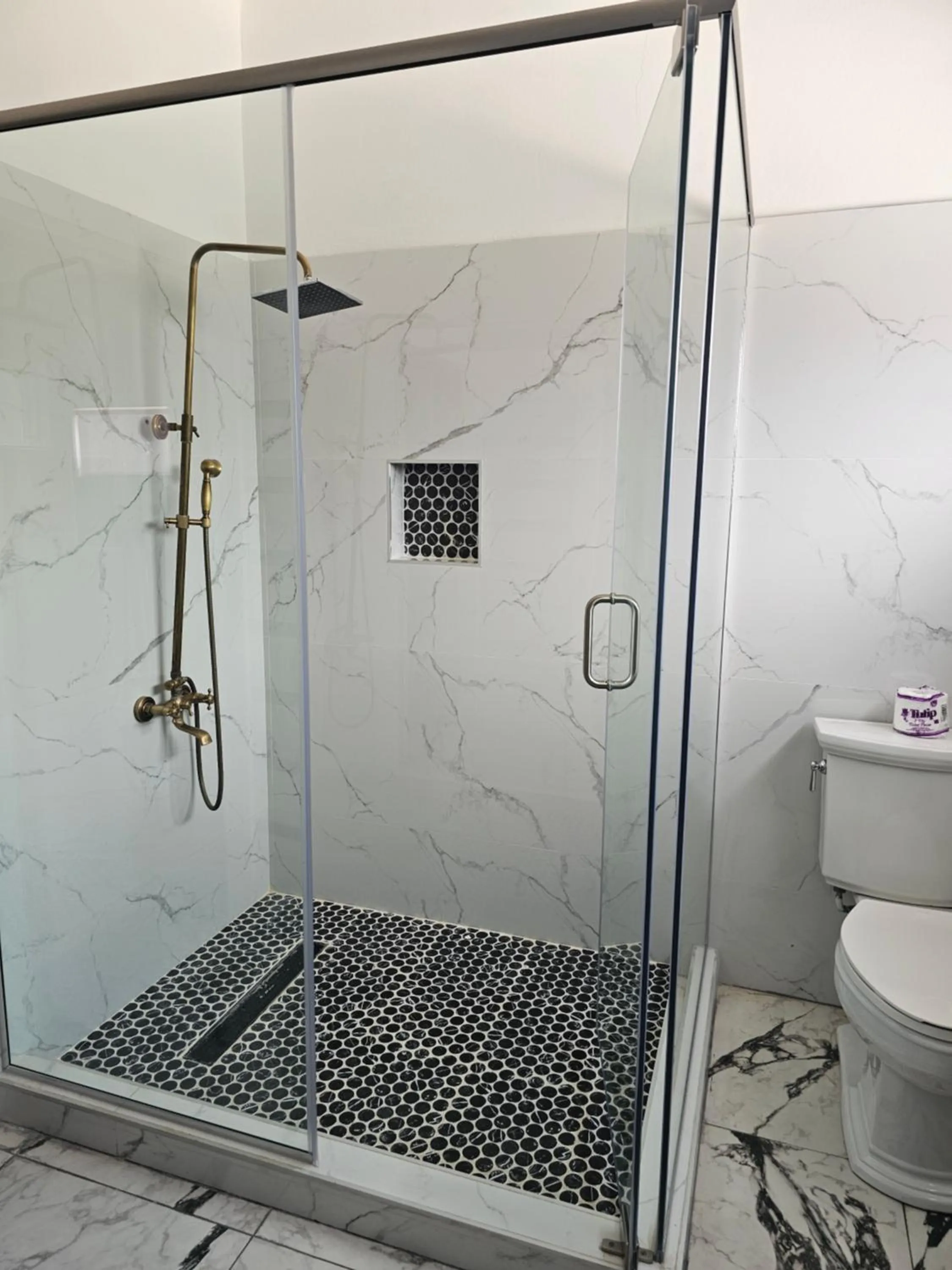 Shower in Roots Cafe Rooms