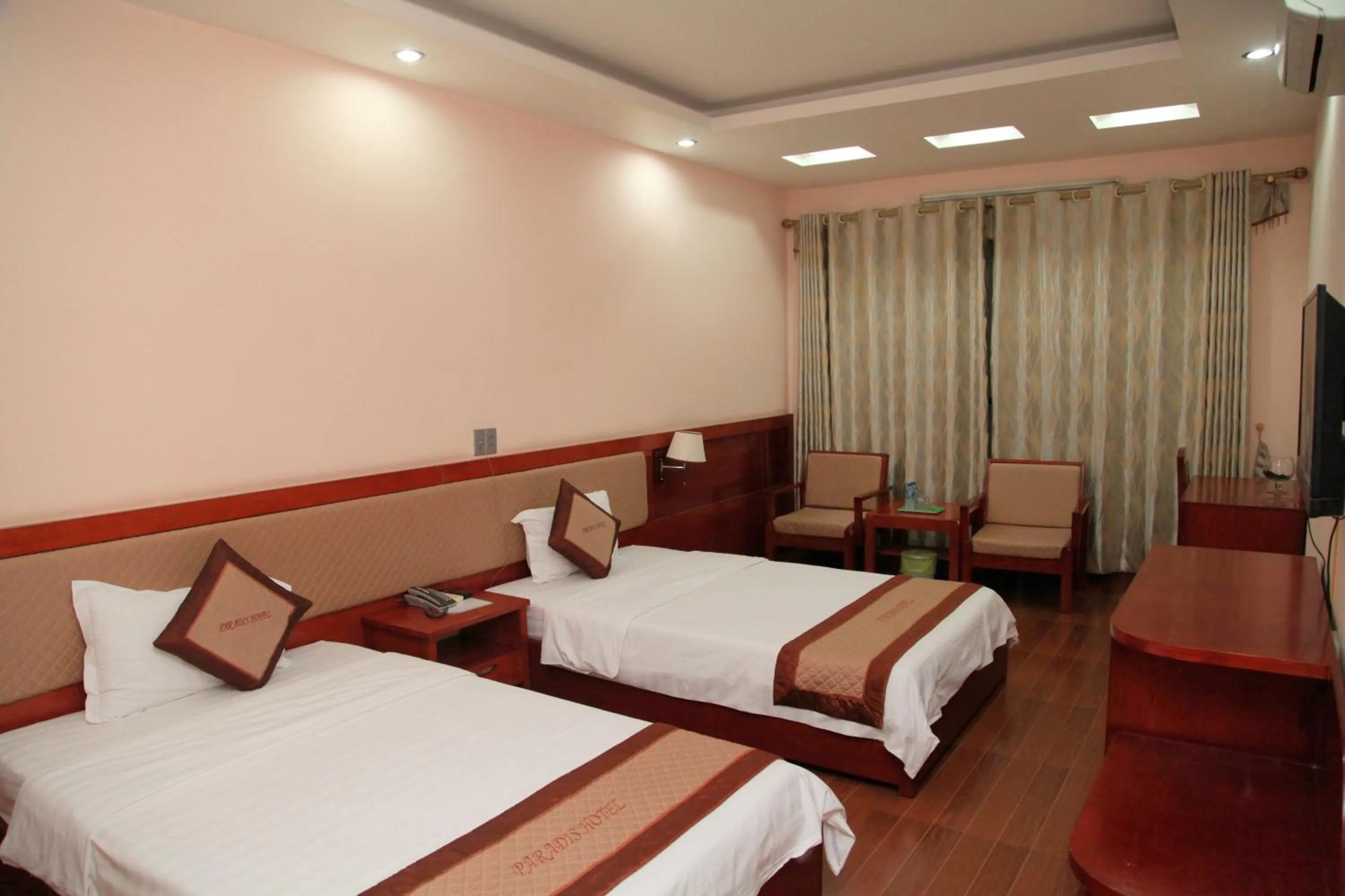 Bed in Paradis Hotel