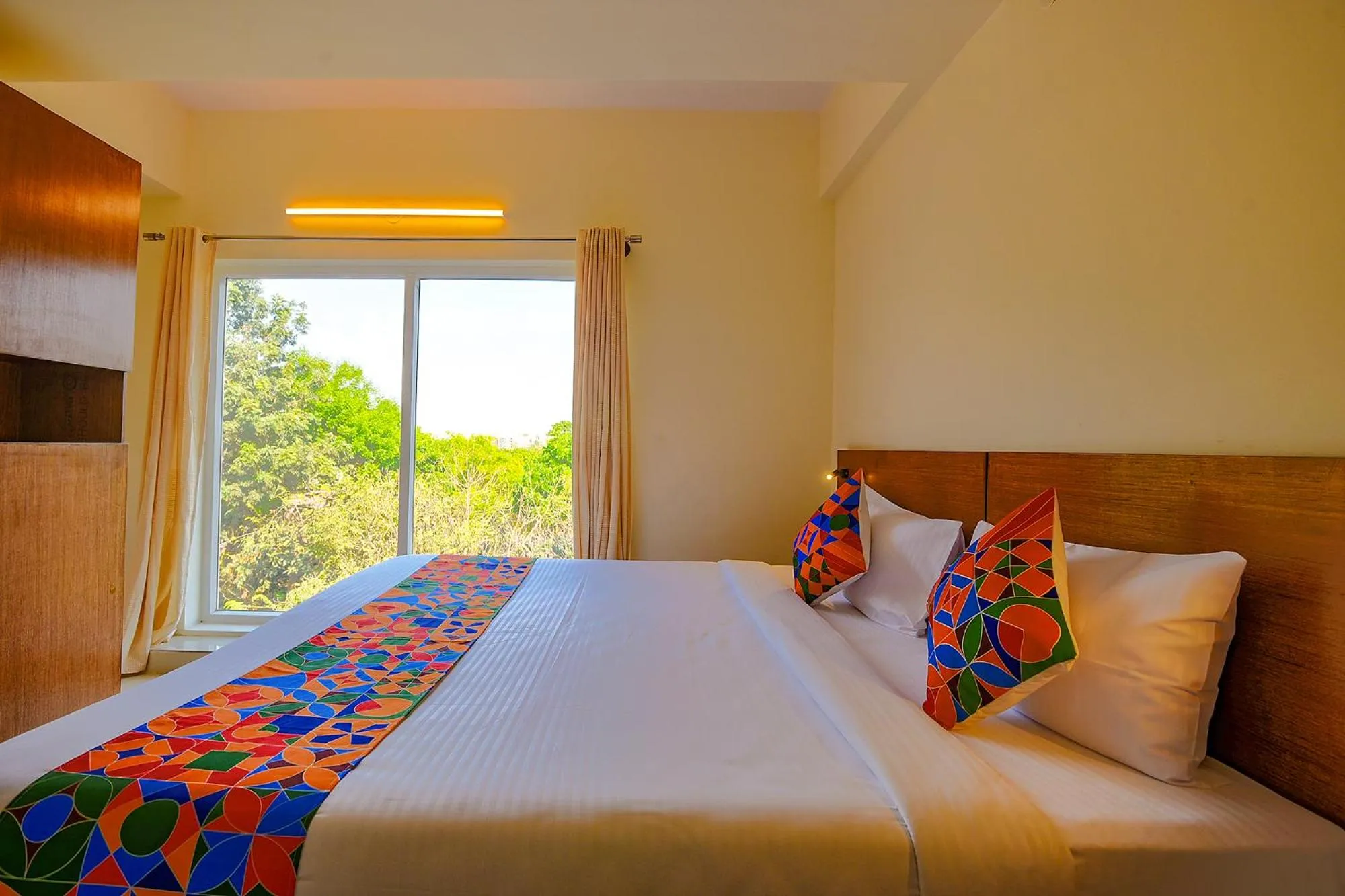 Photo of the whole room, Bed in FabHotel GR Lake View - BTM Layout