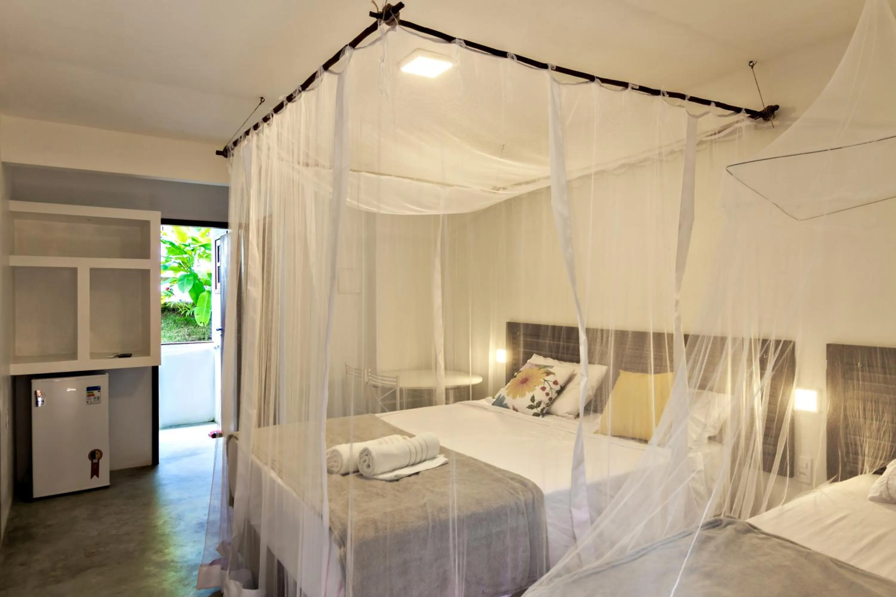 Bed in Pousada Imperador do Espelho