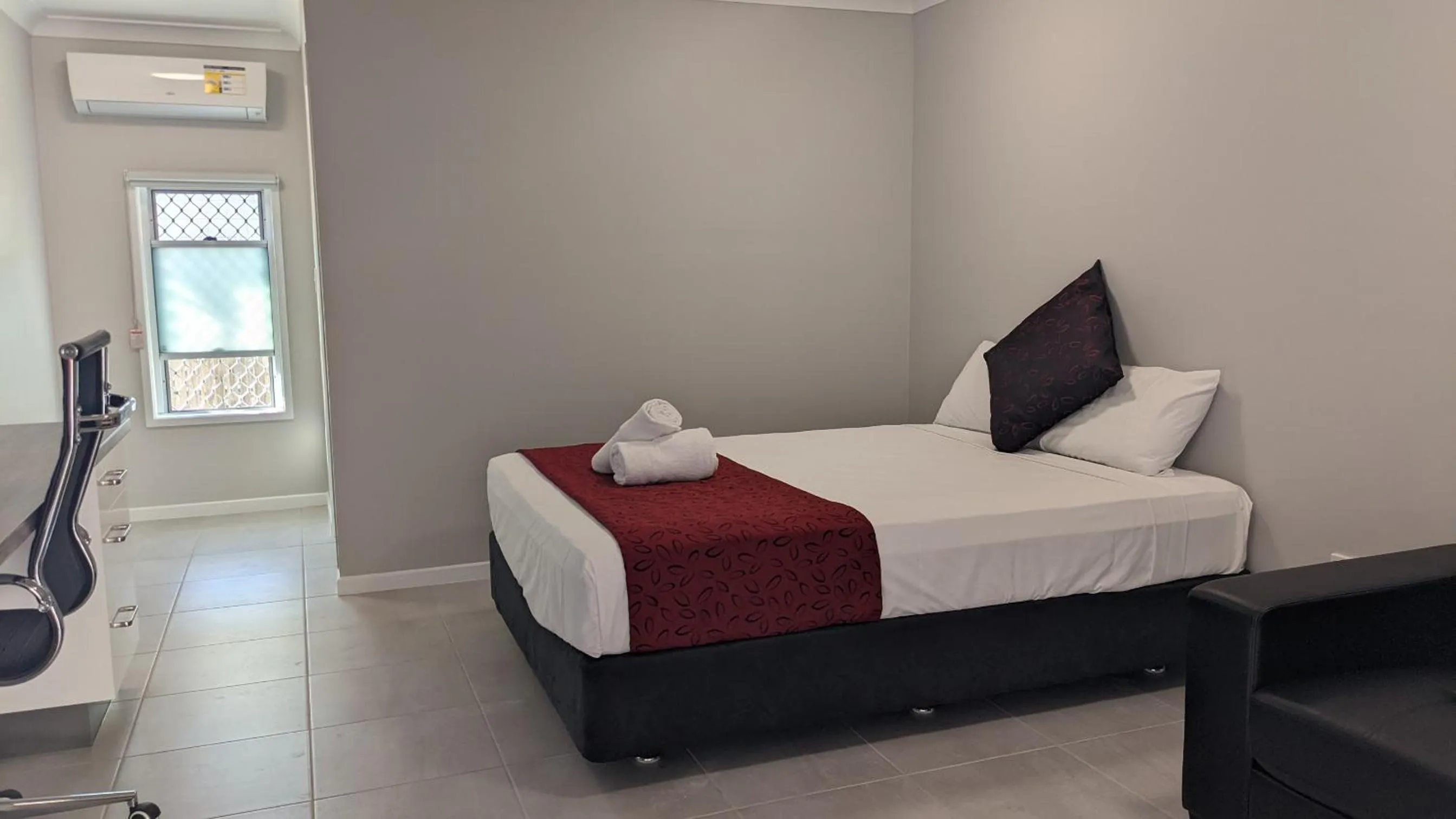 Bed in Monte Carlo Motor Inn