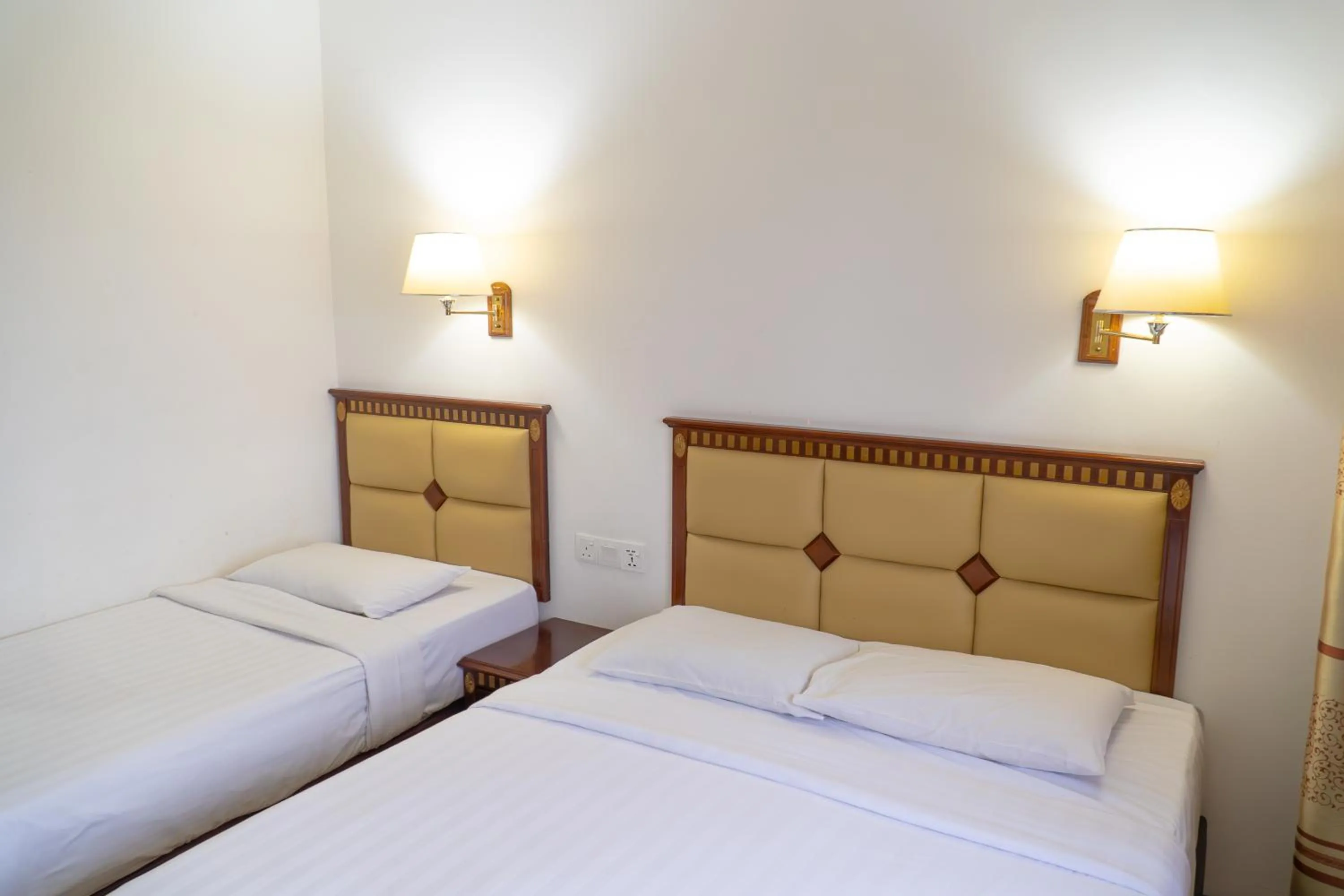 Bed in Borneo Suites Hotel