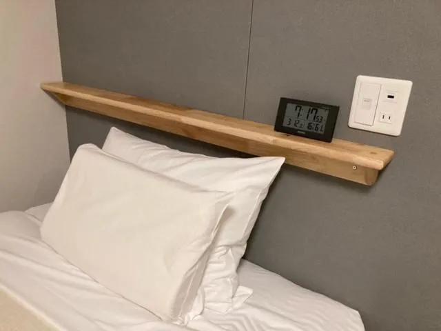 Bed in Station Hotel Nagasaki Suwa