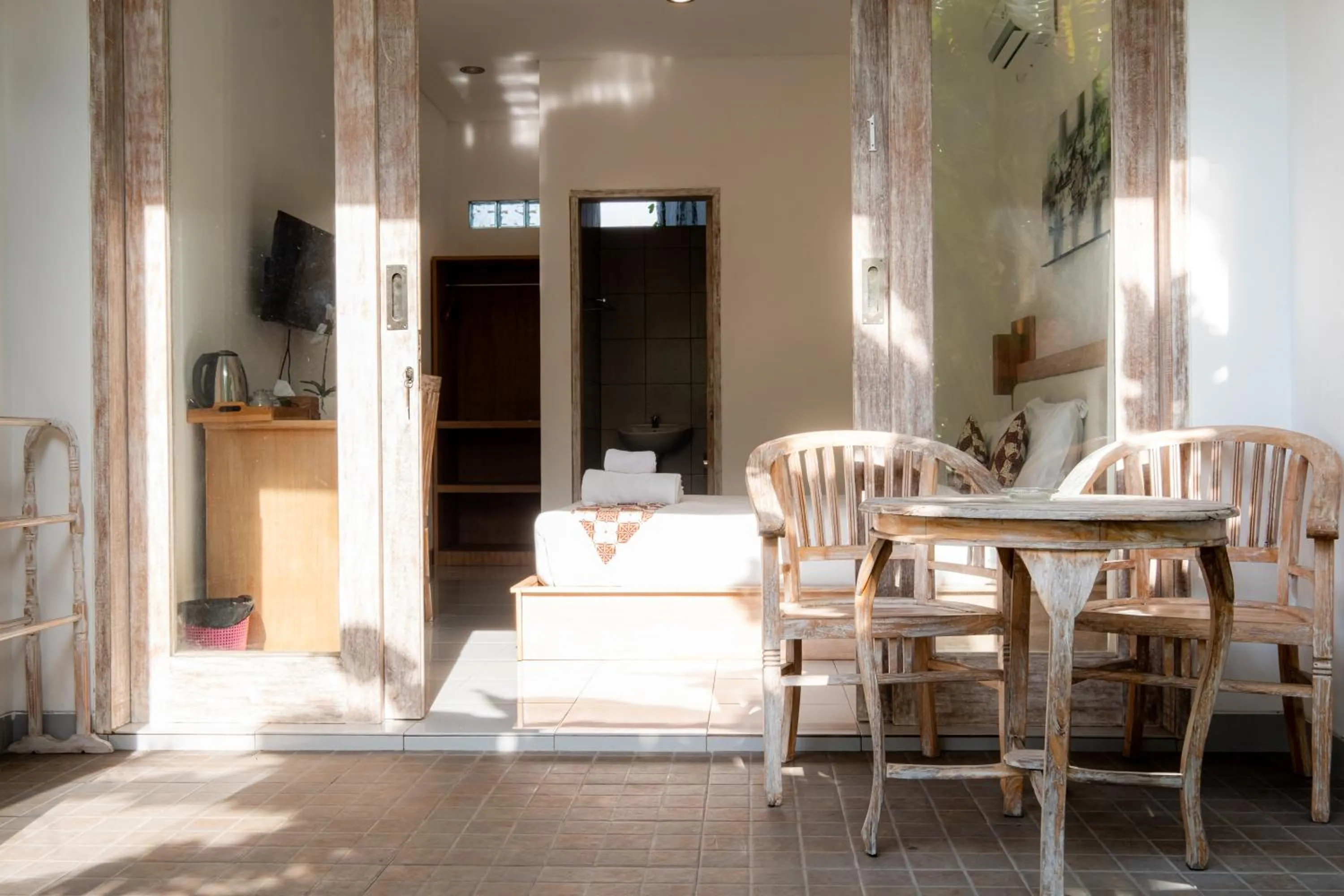 Seating area in Suweta Homestay with Private Pool by Supala