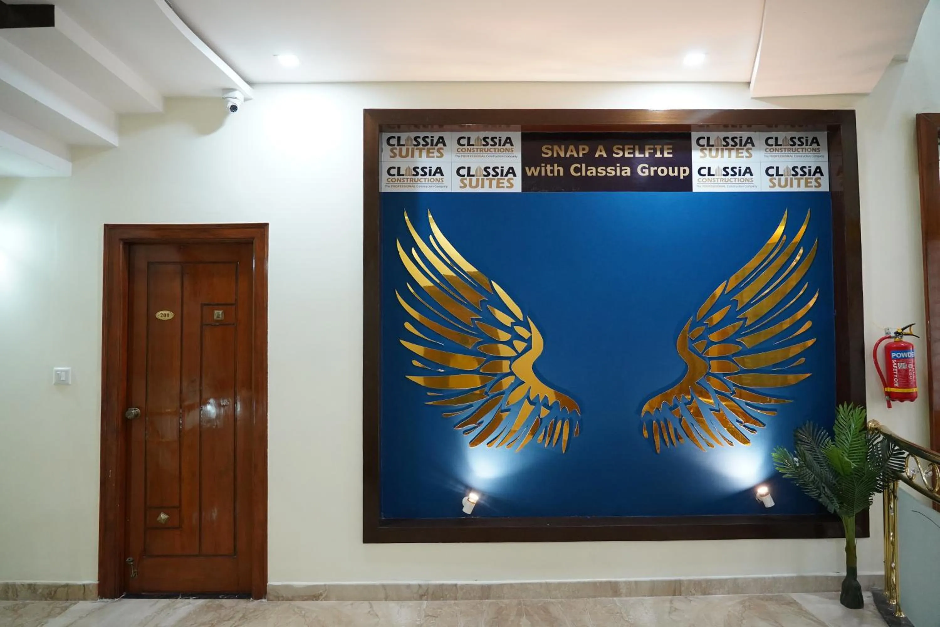 Property logo or sign in Classia Suites