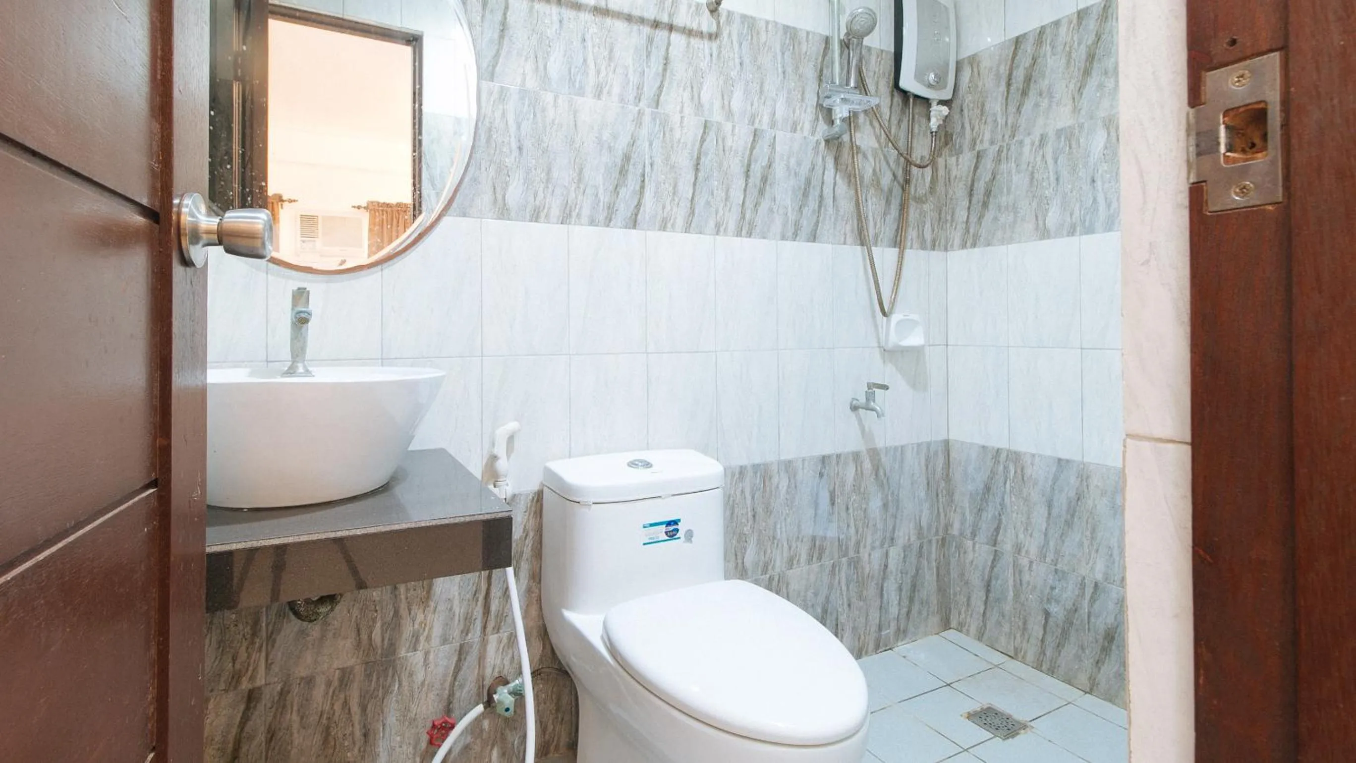 Shower in WestCourt Inn Ilocos Sur