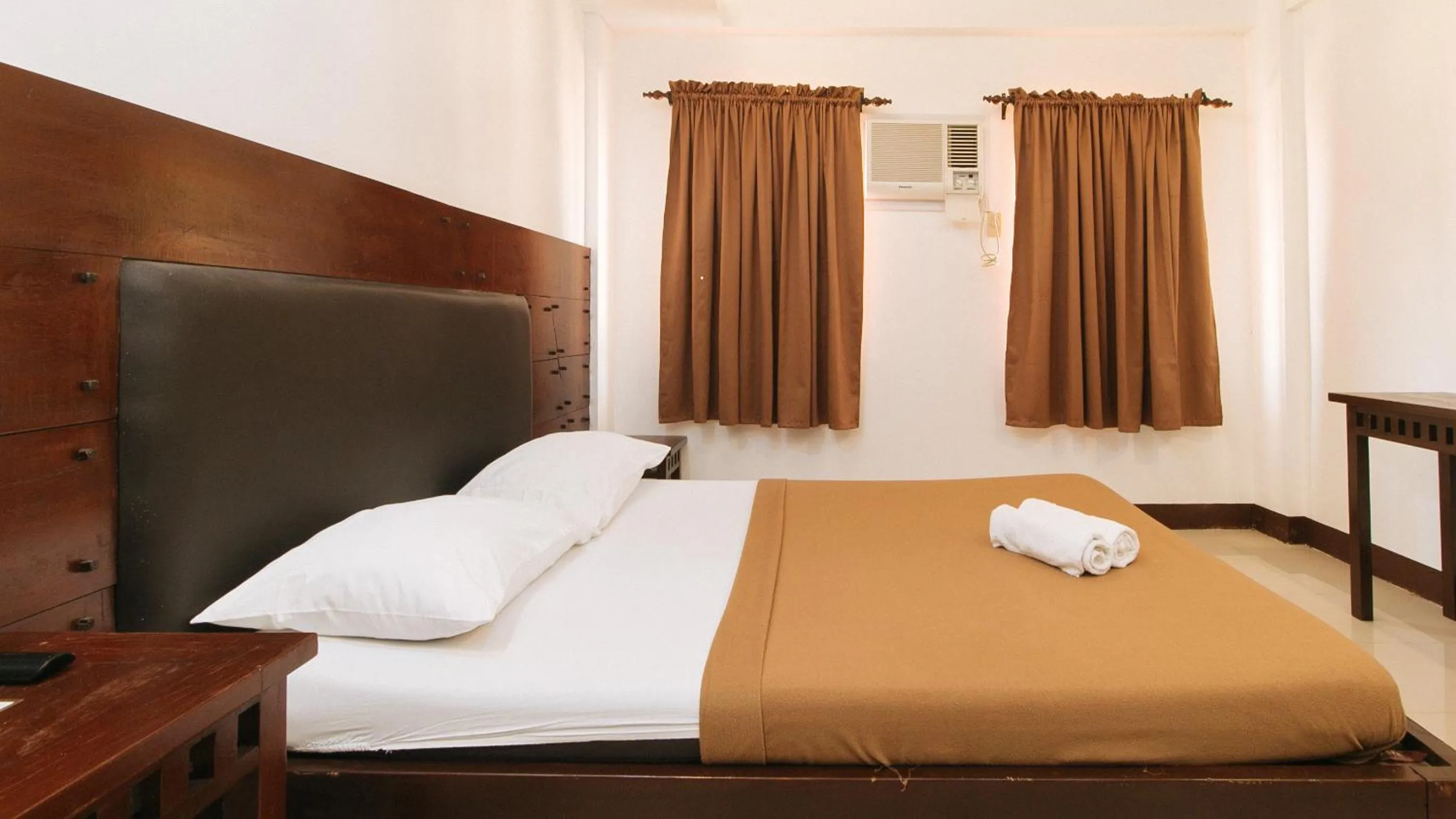 Bed in WestCourt Inn Ilocos Sur