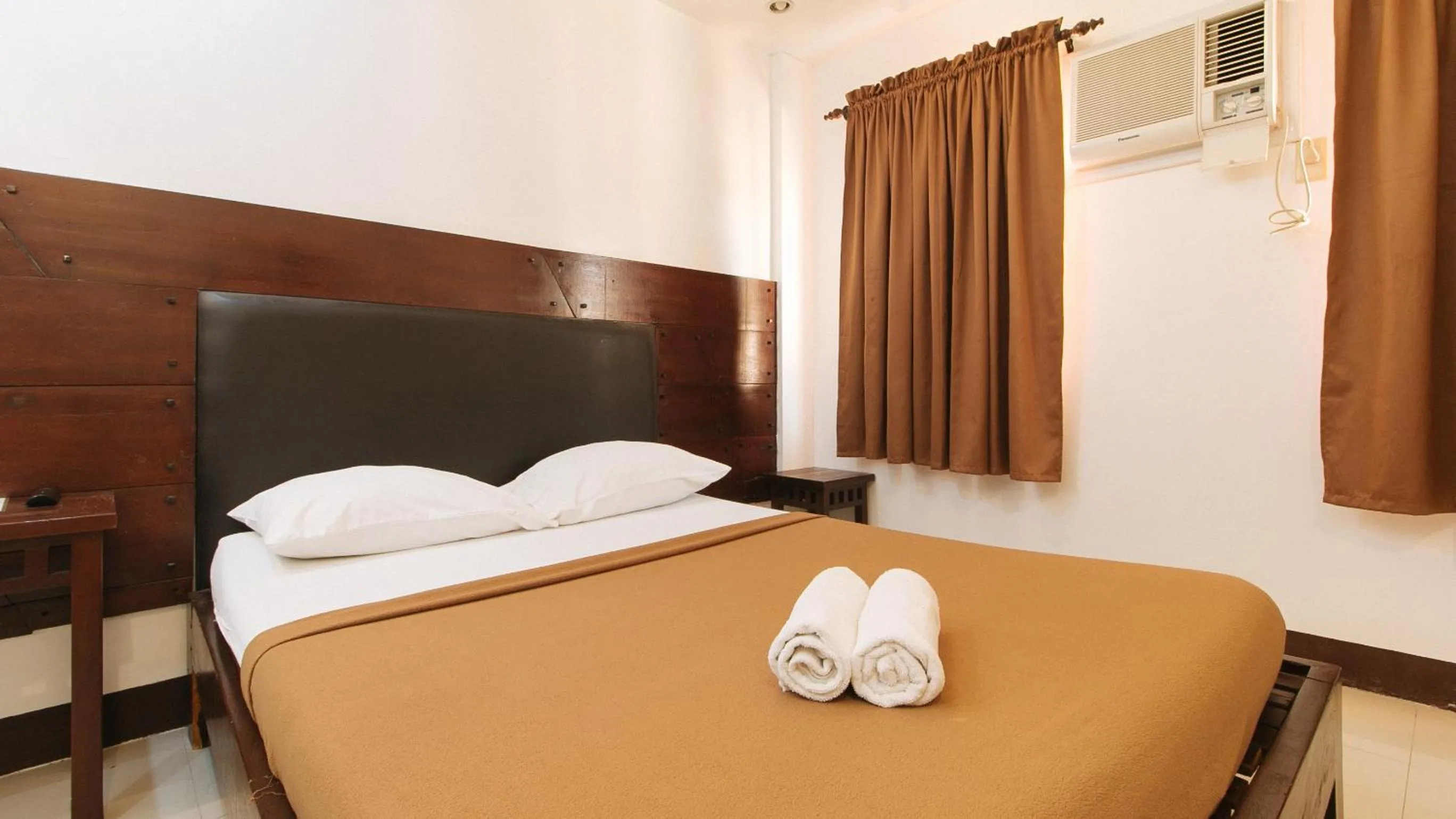 Bed in WestCourt Inn Ilocos Sur