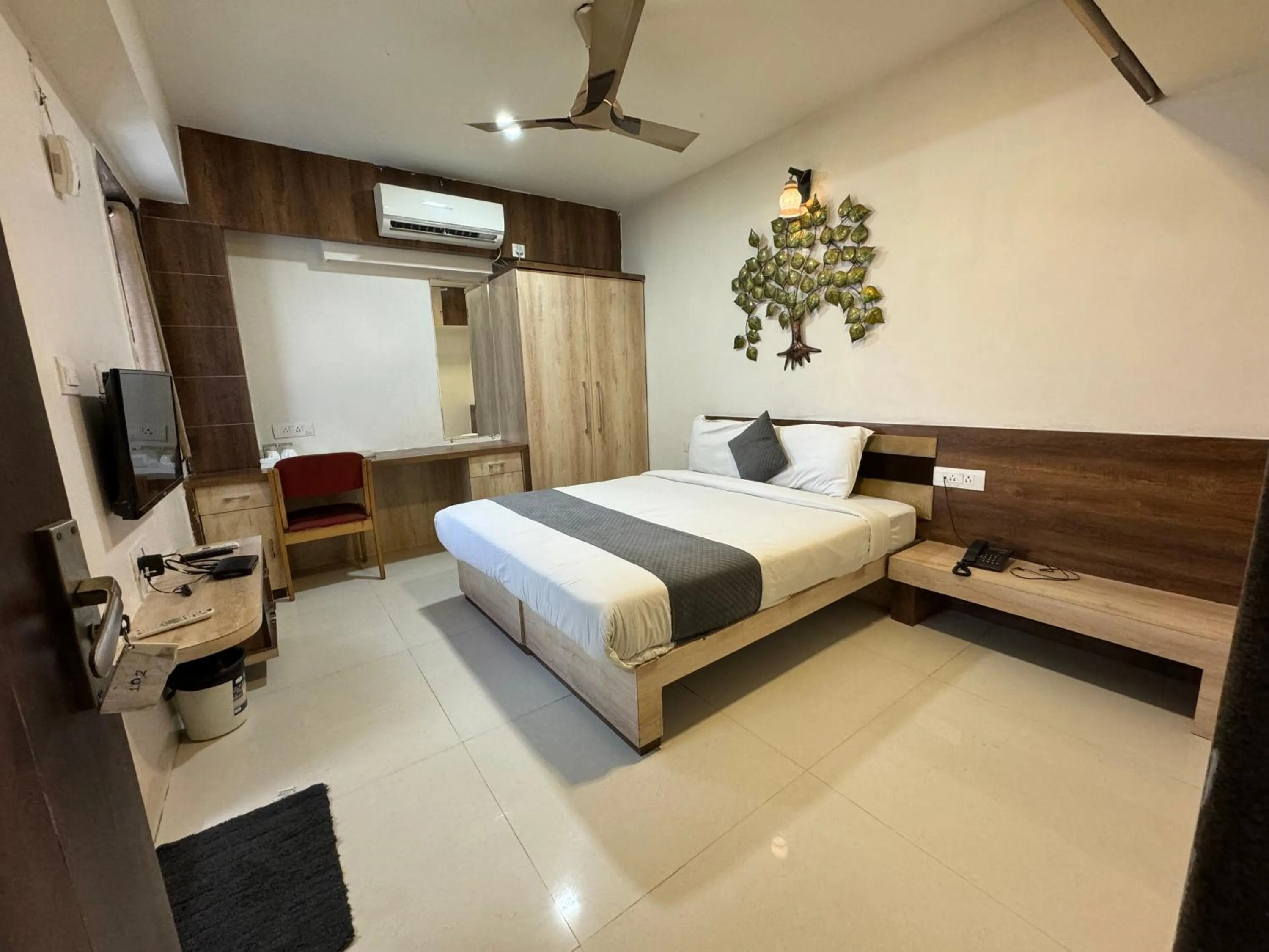 Bedroom in The Tripti Hotel & Banquets