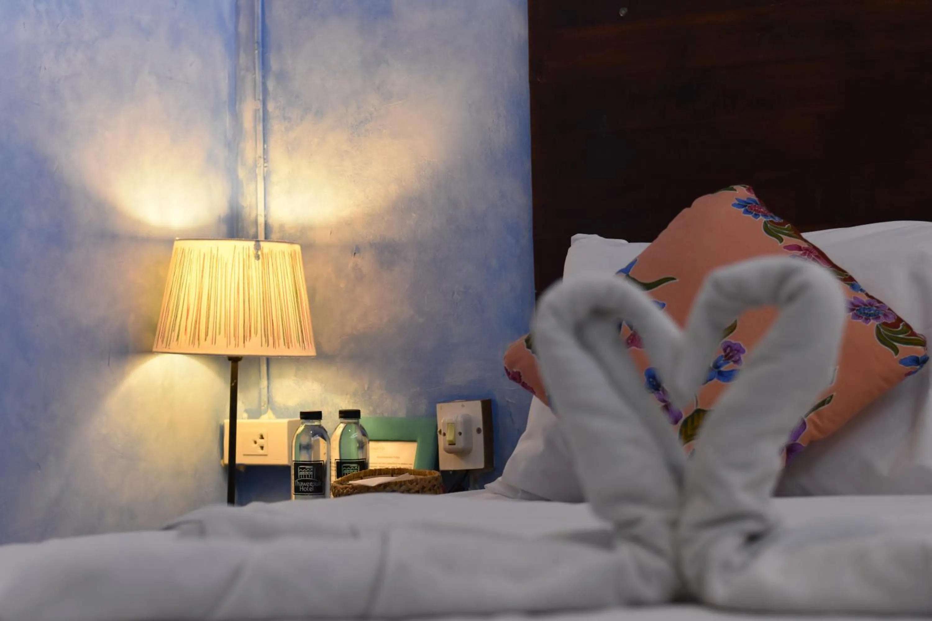 Bed in Thaweesuk Heritage Homestay