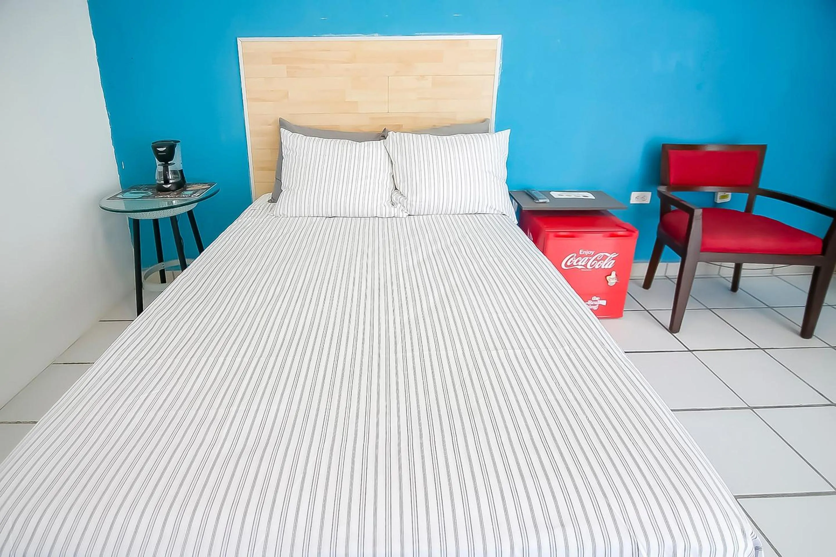 Bedroom, Bed in OYO Hotel Plaza Las Torres, Cabo San Lucas