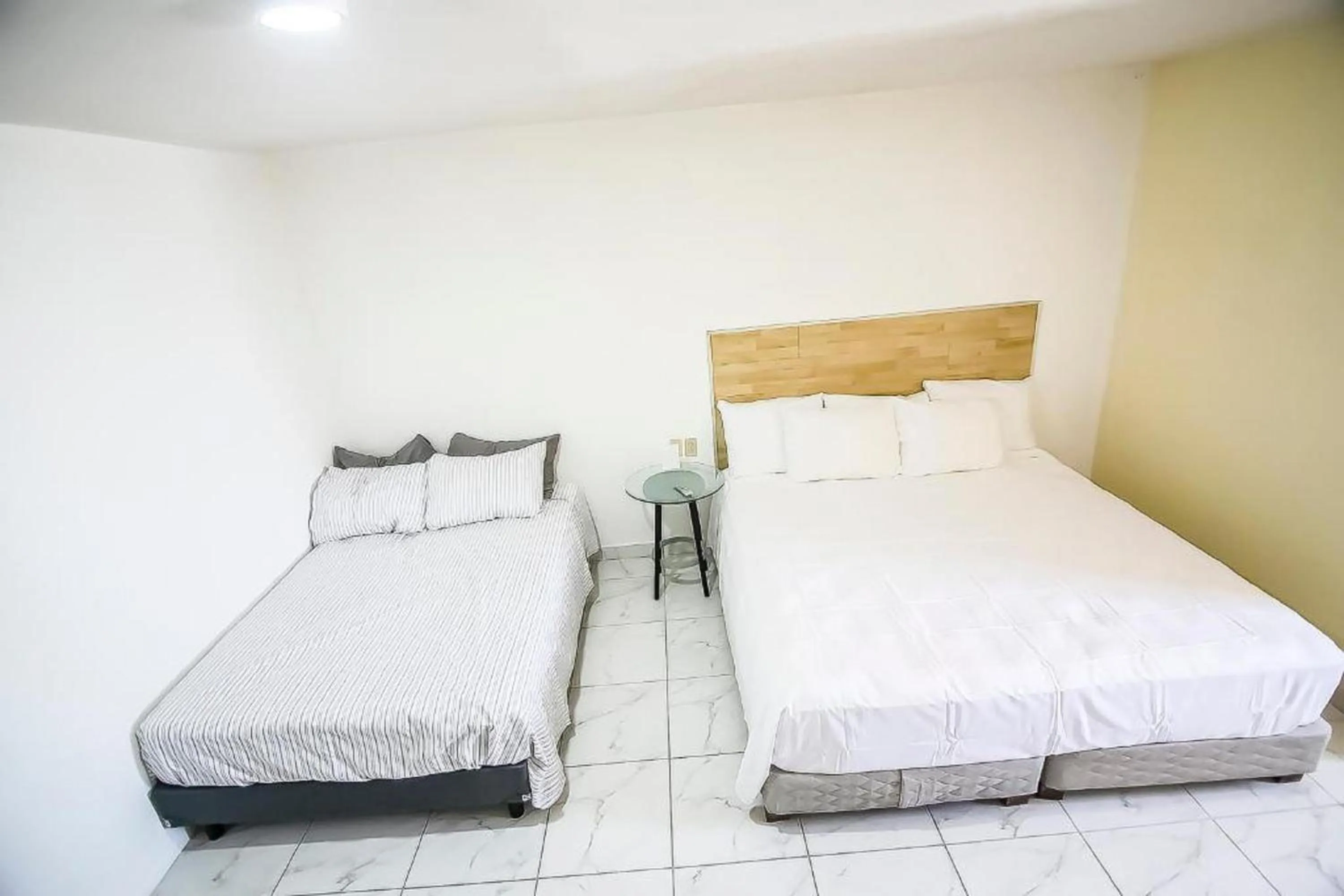 Bedroom, Bed in OYO Hotel Plaza Las Torres, Cabo San Lucas