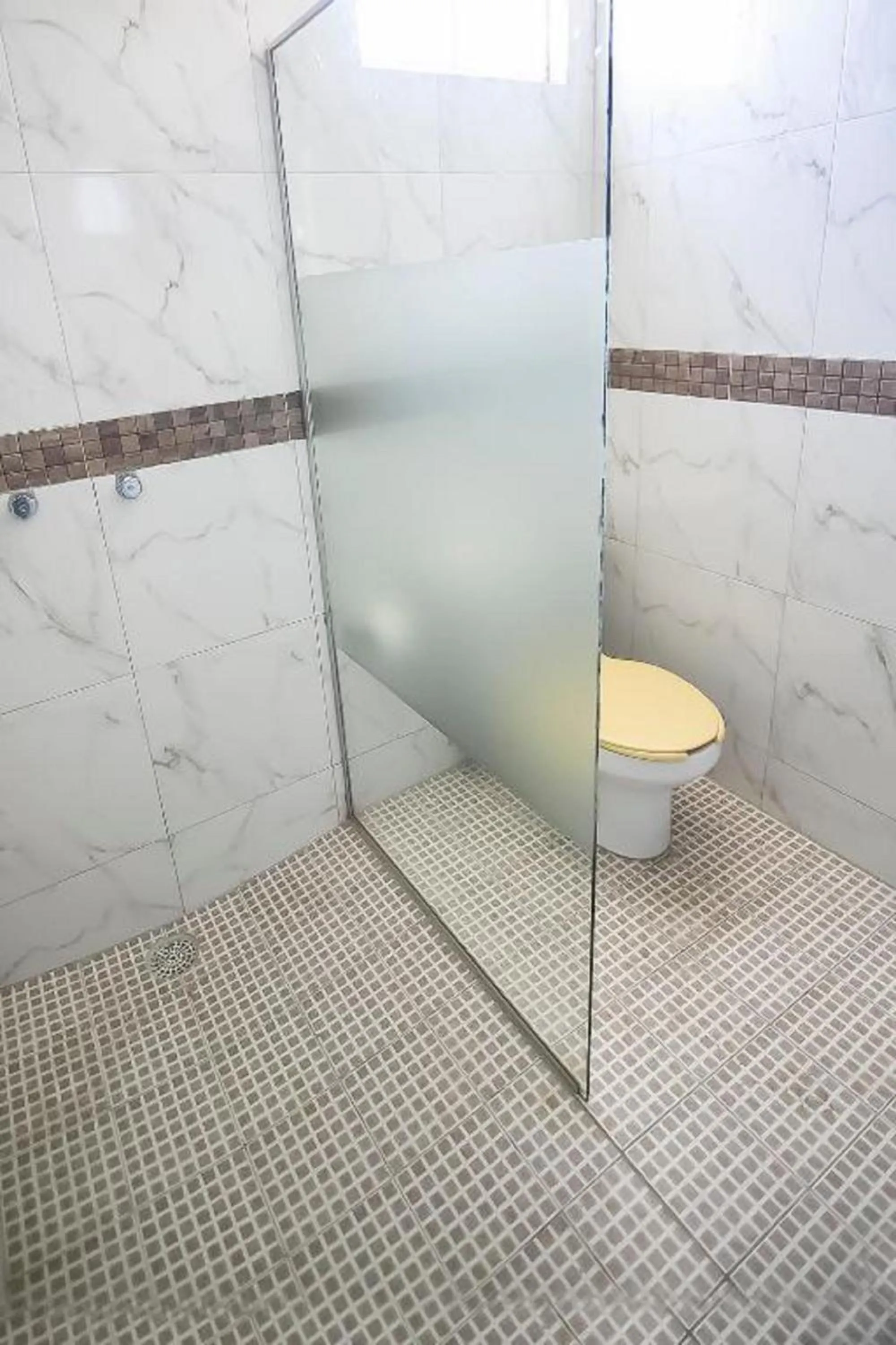 Bathroom in OYO Hotel Plaza Las Torres, Cabo San Lucas