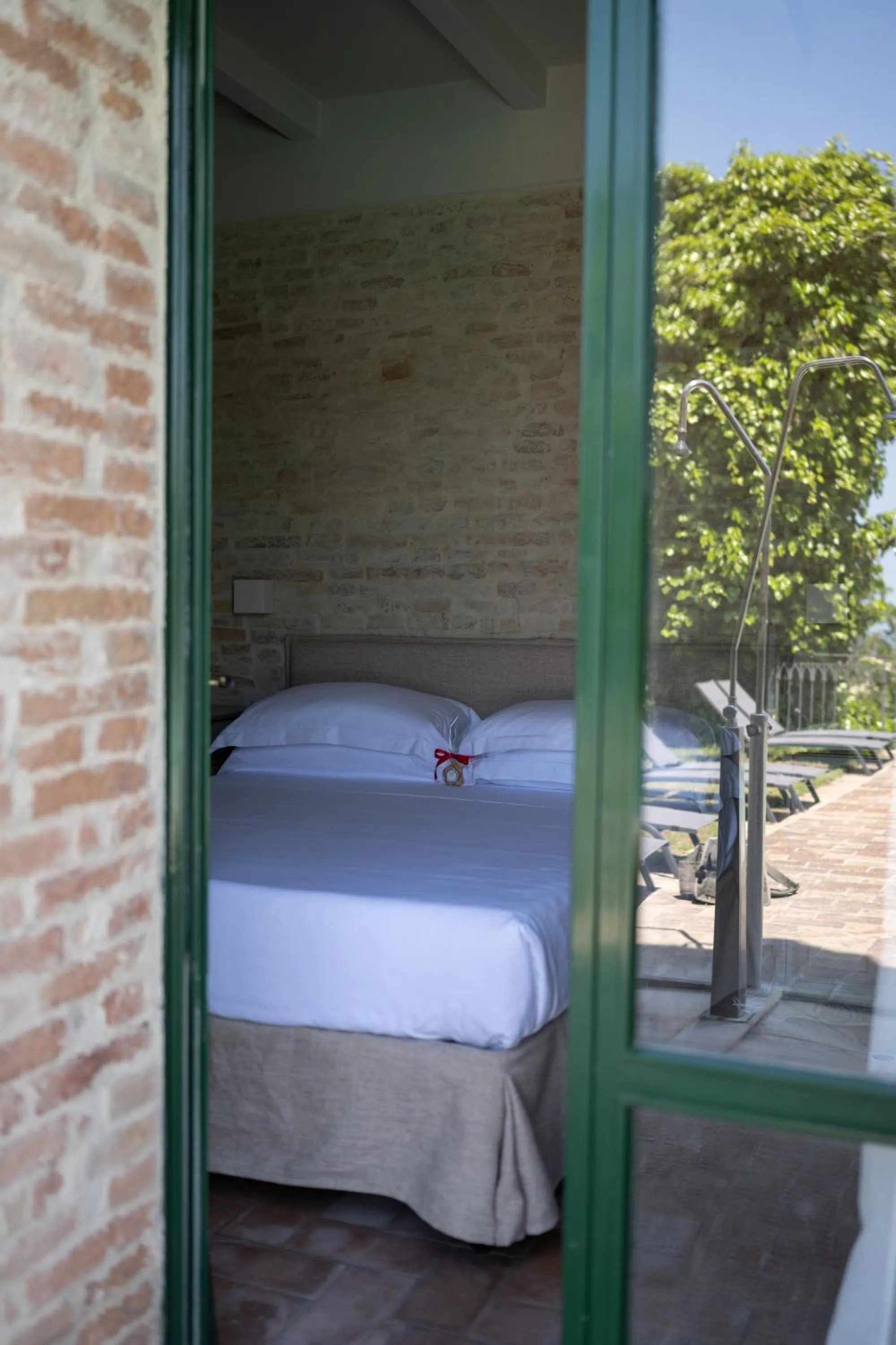 Property building, Bed in Palazzo Viviani - Castello di Montegridolfo