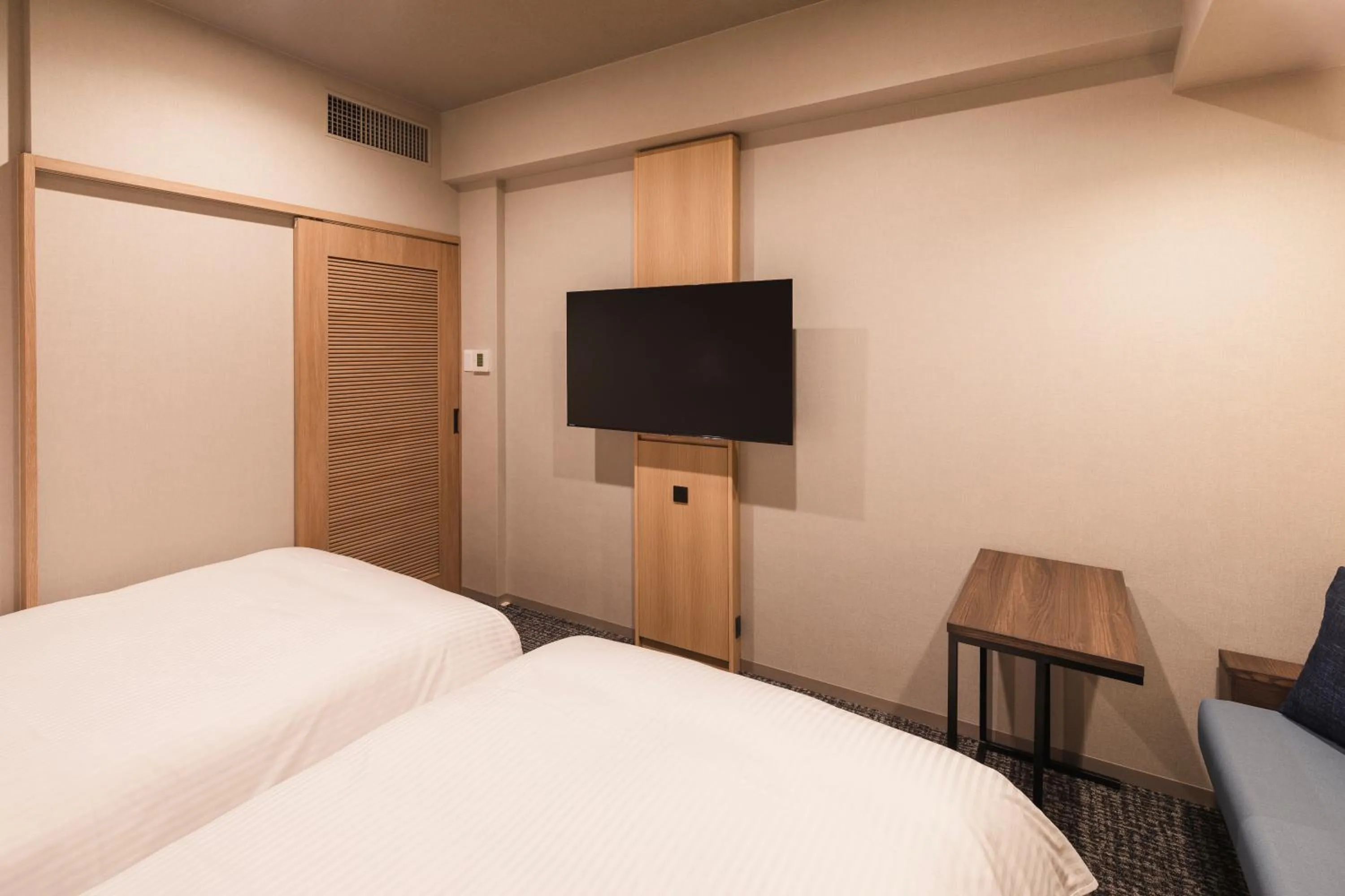 Photo of the whole room, Bed in Sotetsu Grand Fresa Takadanobaba