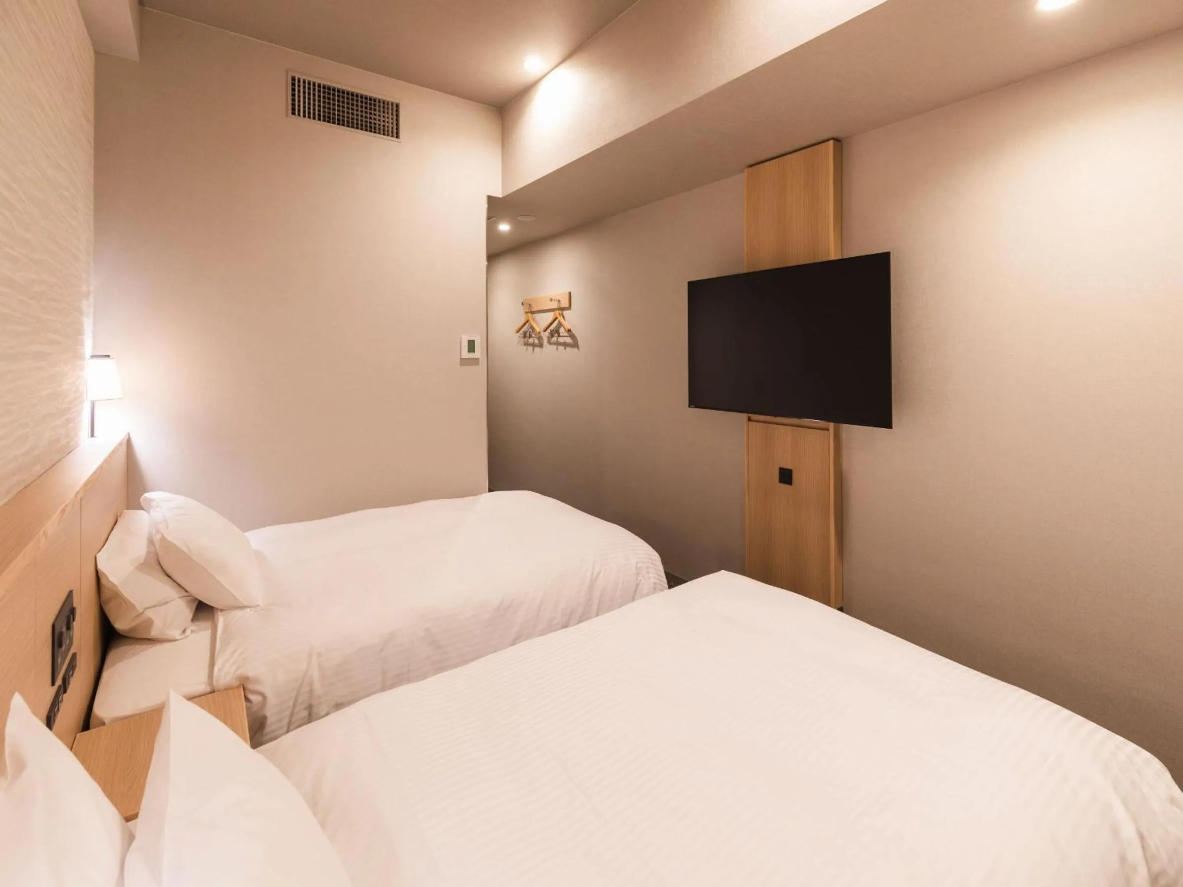 Photo of the whole room, Bed in Sotetsu Grand Fresa Takadanobaba