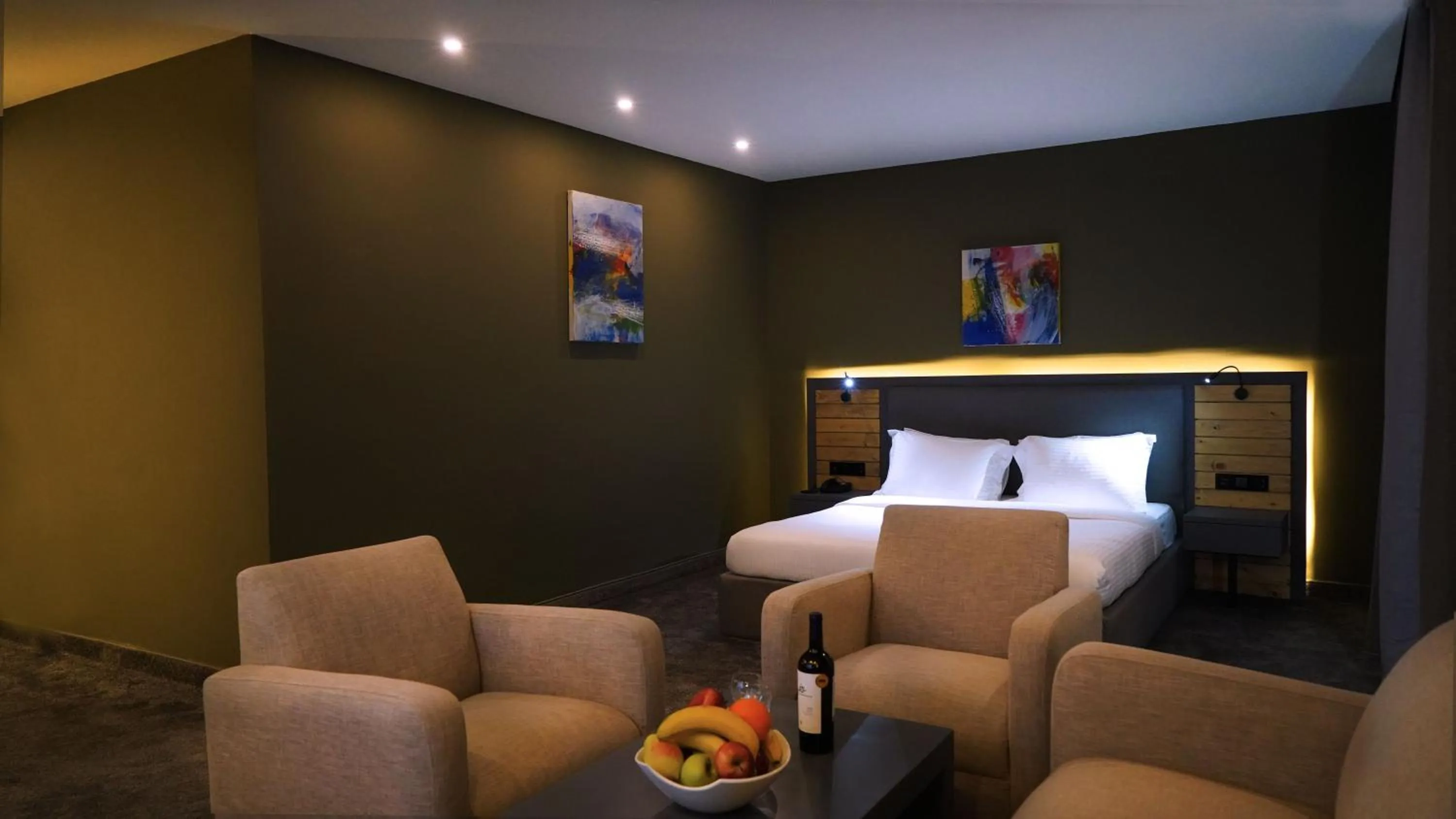 Living room, Bed in Aitch Boutique Hotel - an LIH Hotel