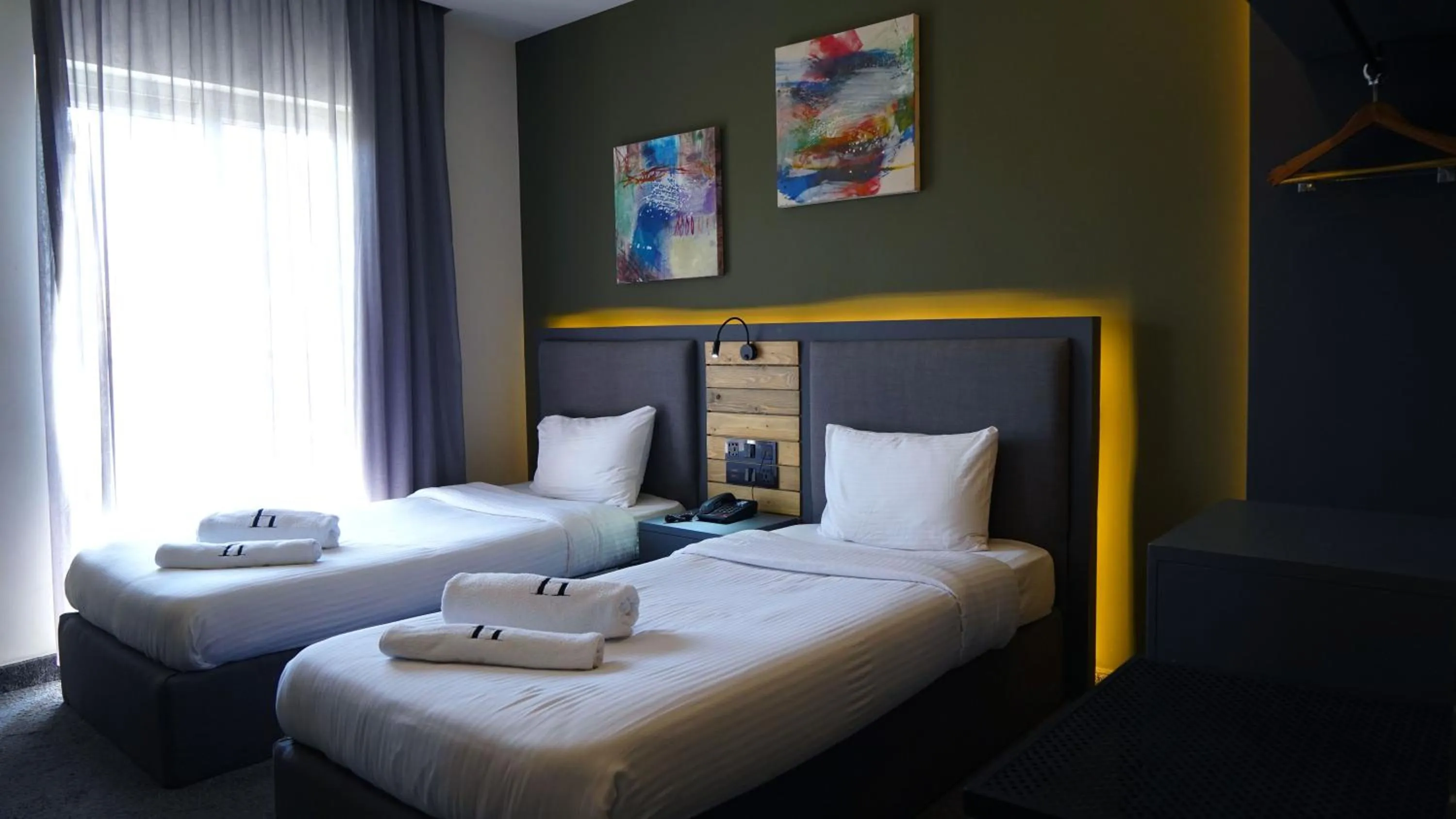 Bed in Aitch Boutique Hotel - an LIH Hotel