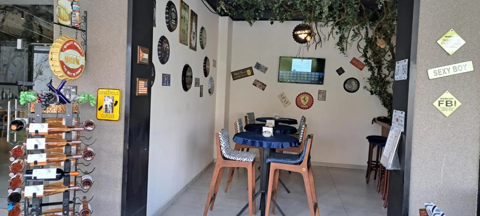 Communal lounge/ TV room in Aitch Boutique Hotel - an LIH Hotel